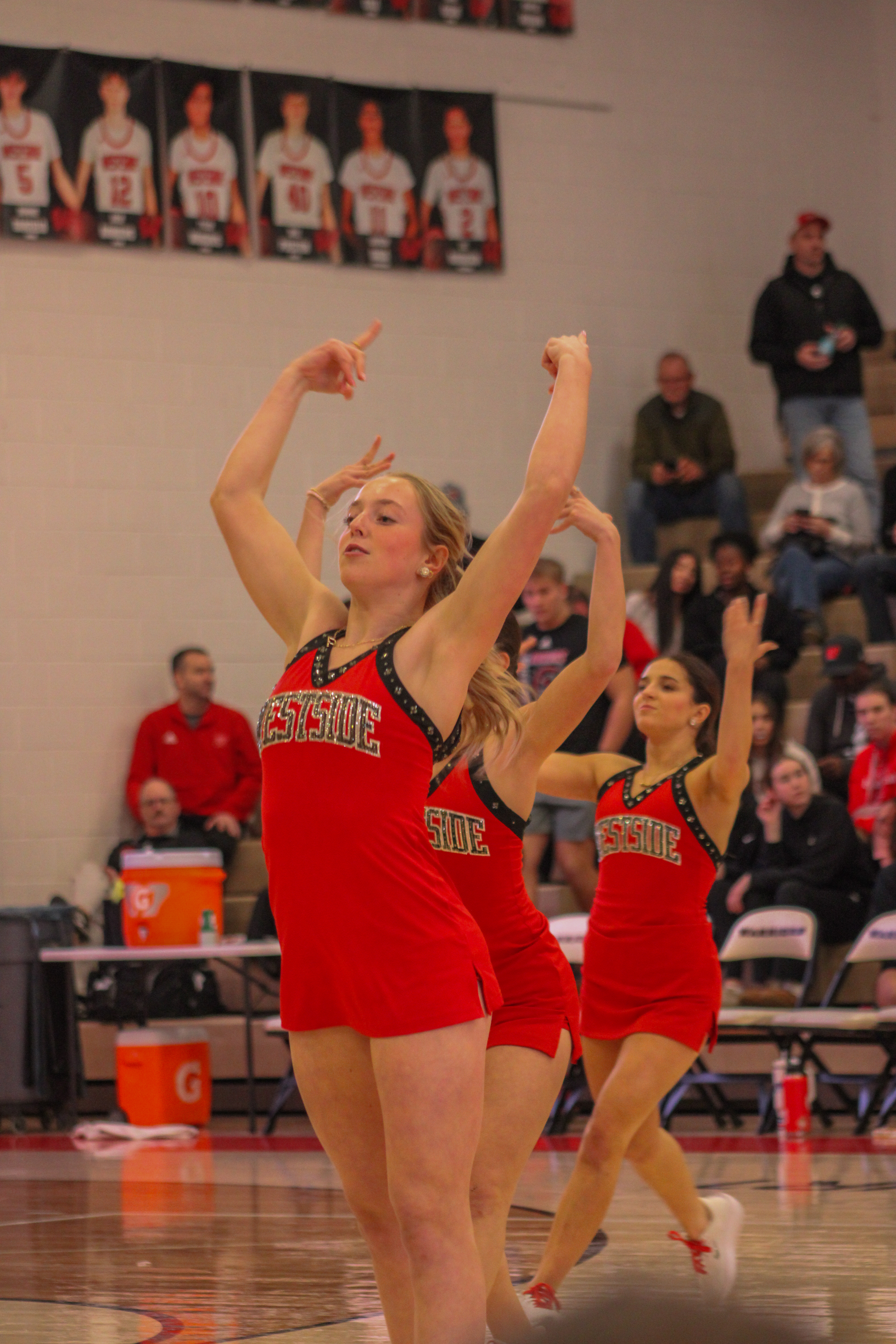 Senior Paige Smith performs during the half - time.