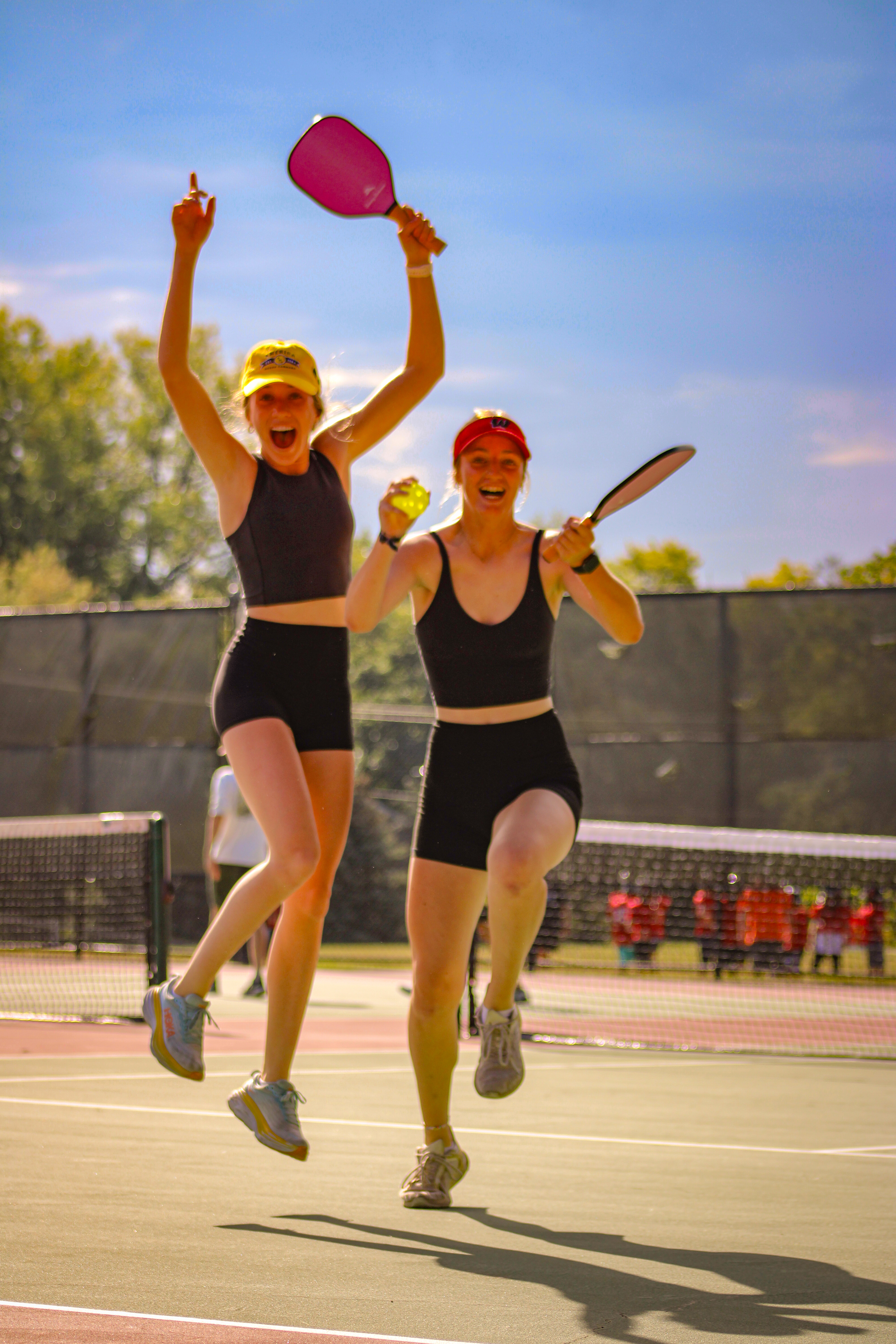 Juniors Luci Procter and Vannessa Burton celabrate advancing to the final rounds of the Pickle-Ball tournament.