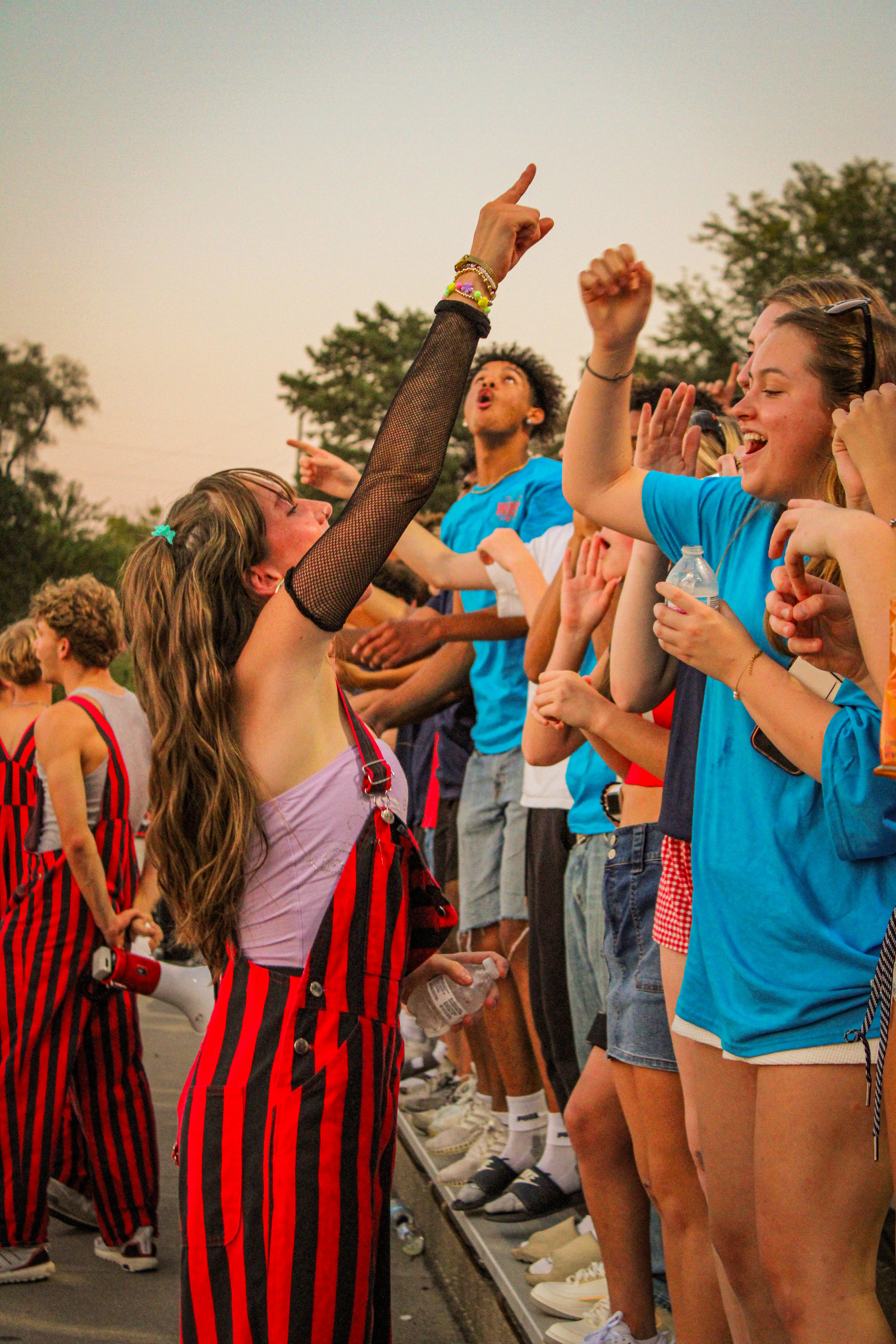 Senior Lilah Erftmier leads the student section in a chant.