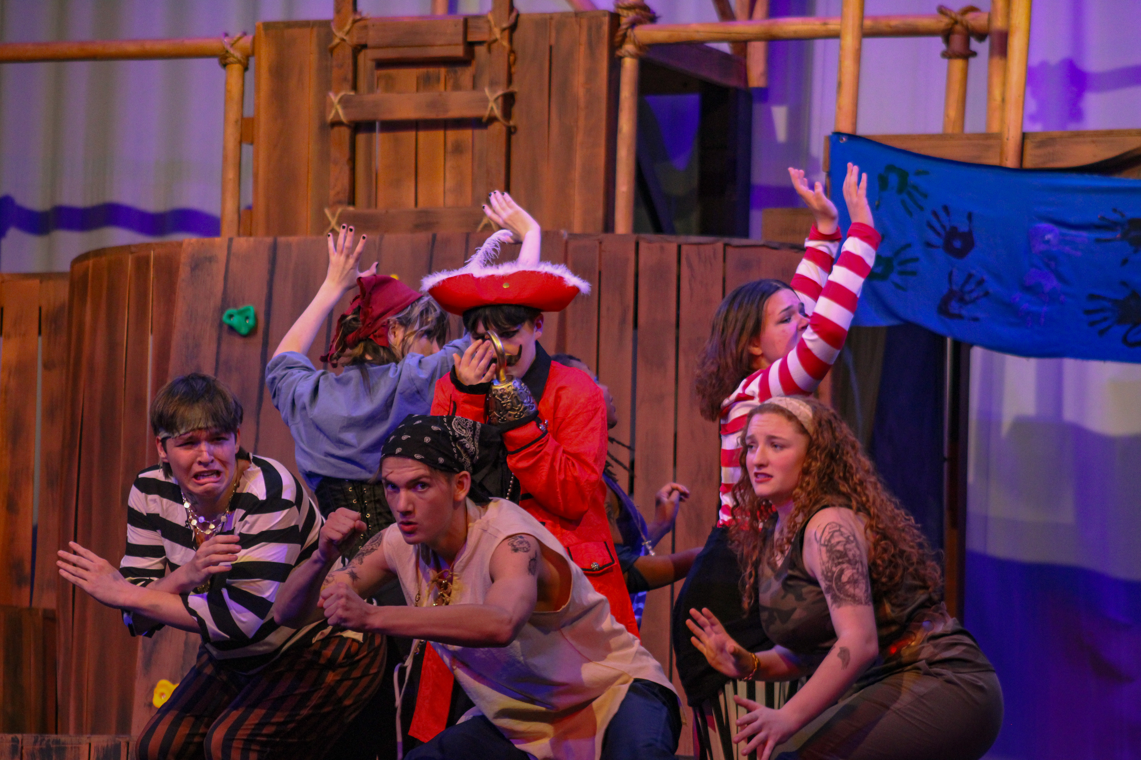 Beck is surrounded by Pirate companions.