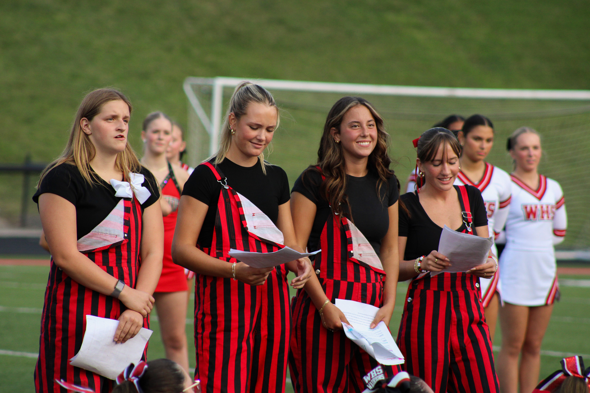 Red Shield members announce at the 2024 Back To School BBQ.