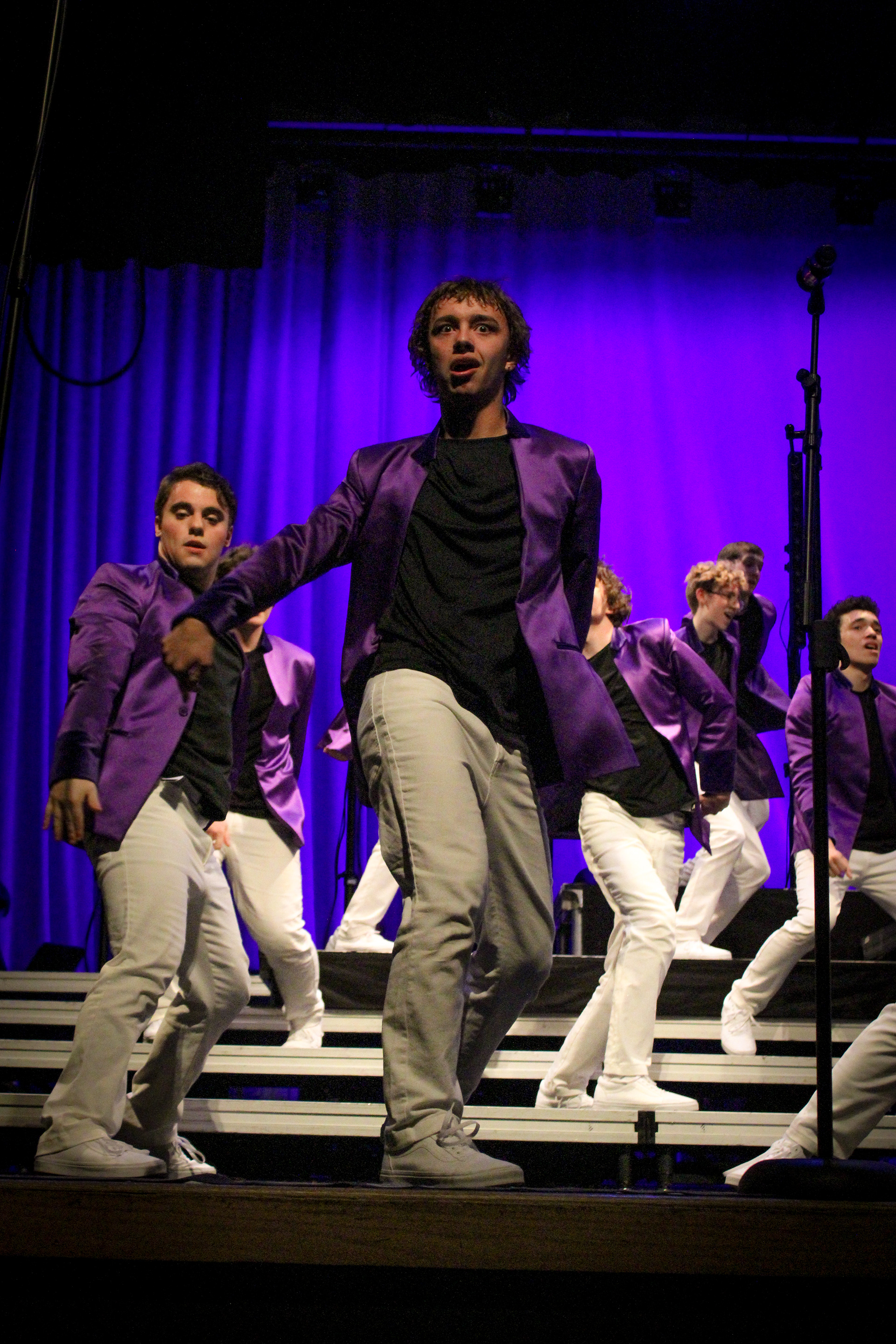 Junior Nick Day dances during the finale song of ATSC's show, "Moving Forward".