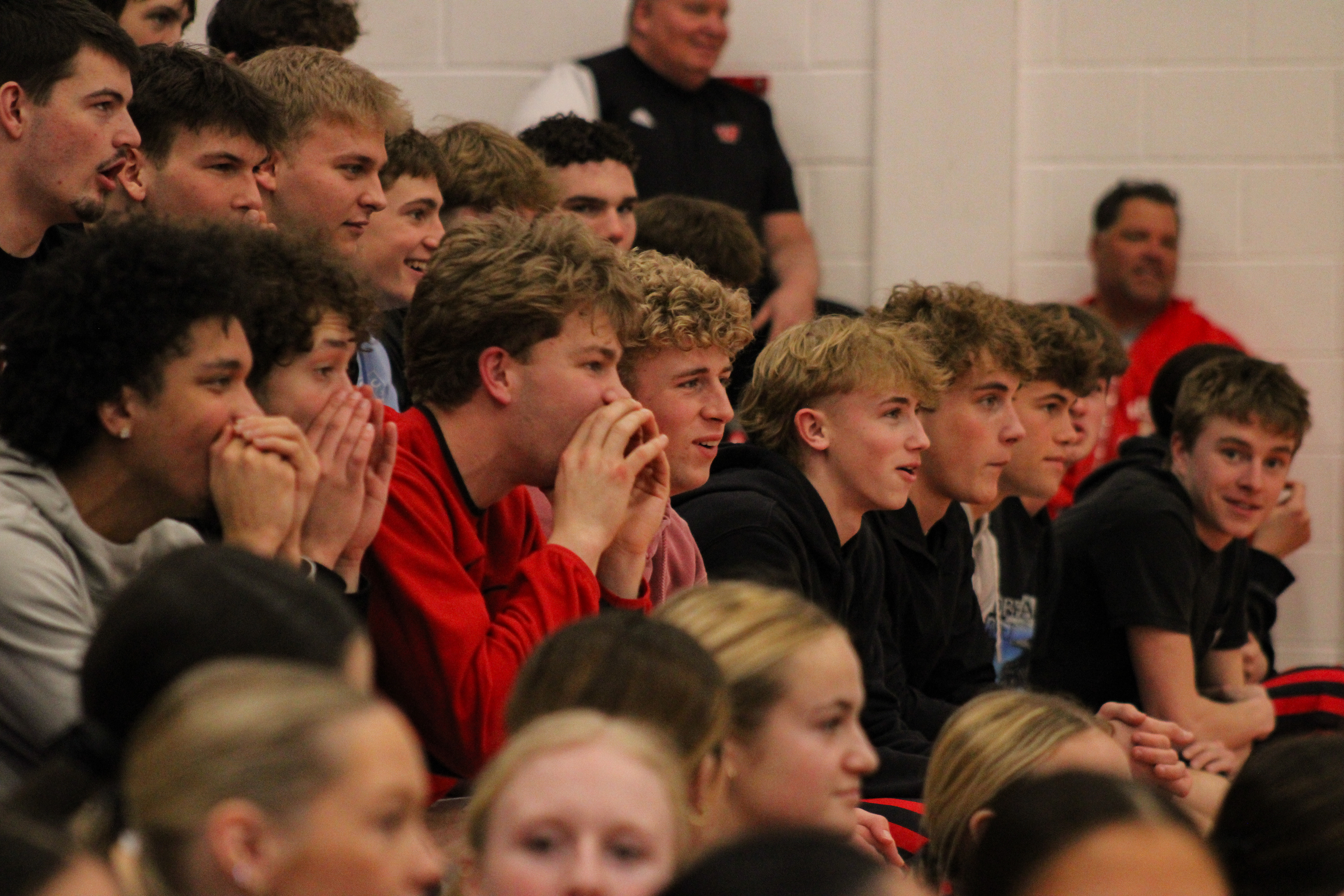 Students watch while people compete to win $500.