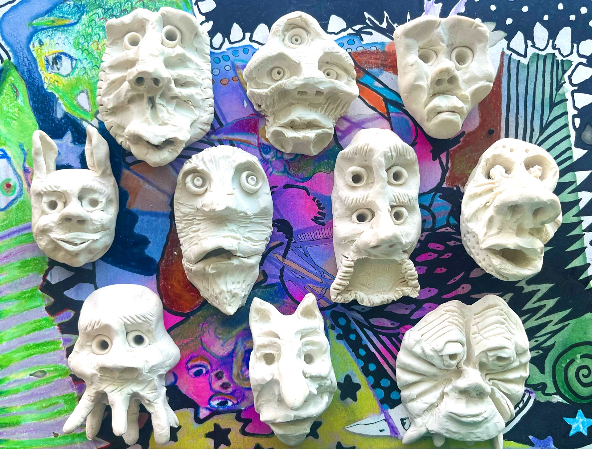 heads, 2025. modeling clay and magnets