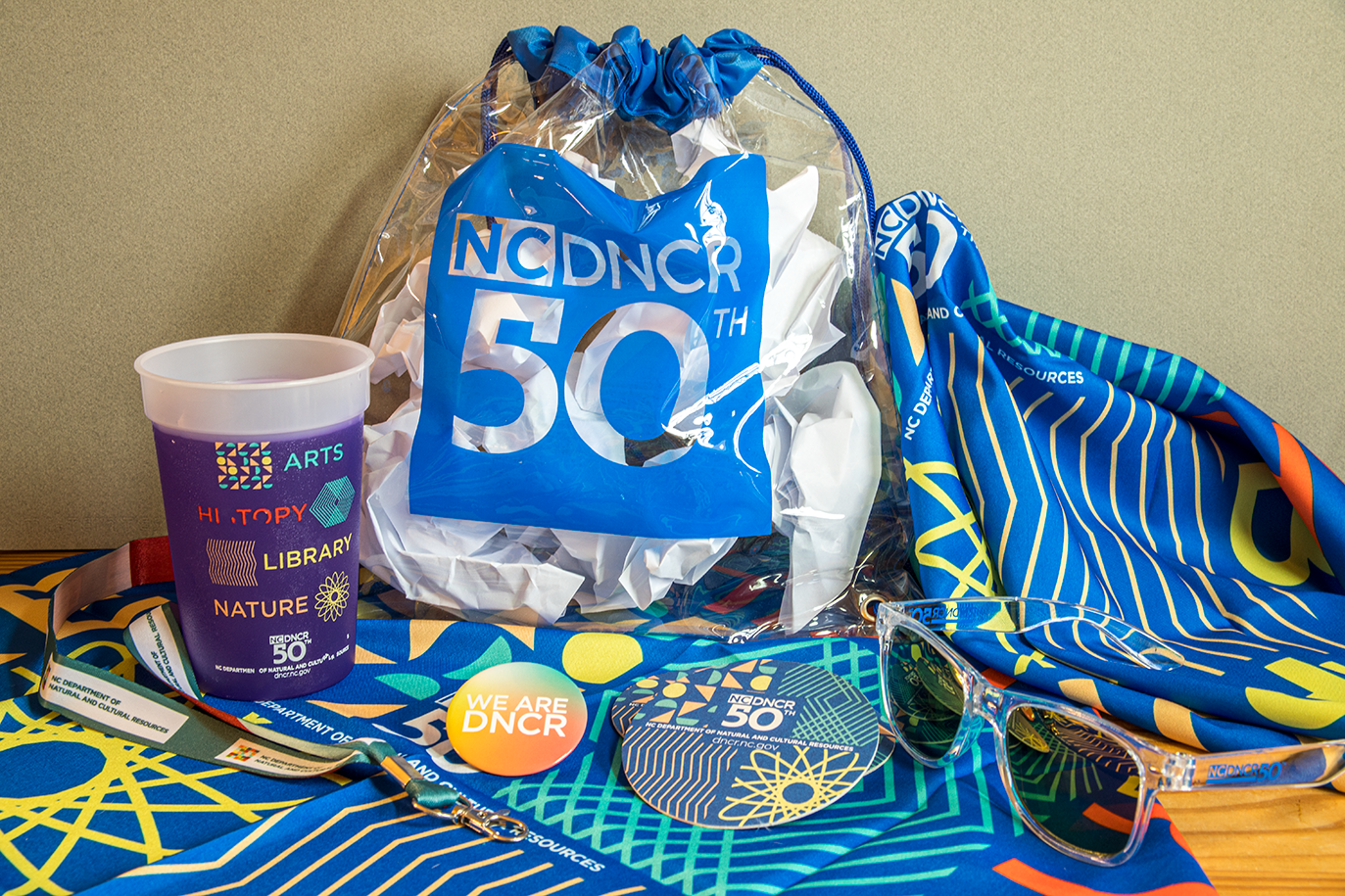 A collection of branding swag created for 50th anniversary.