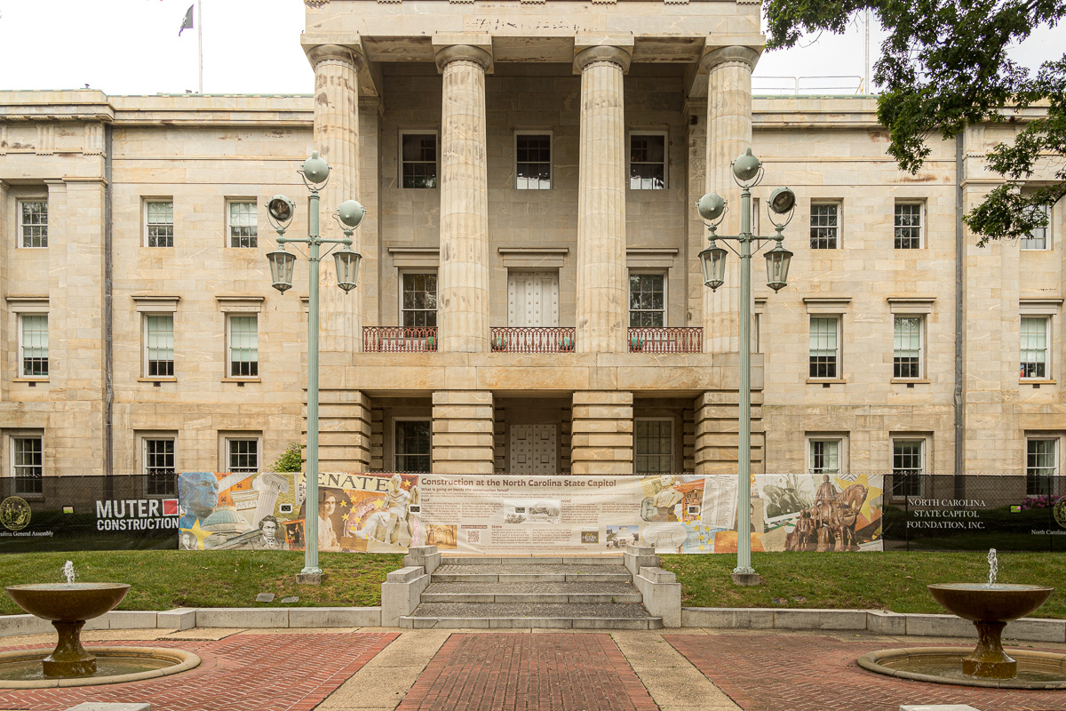 View of the Fence Screen Installation with the facade of the State Capitol building visible.