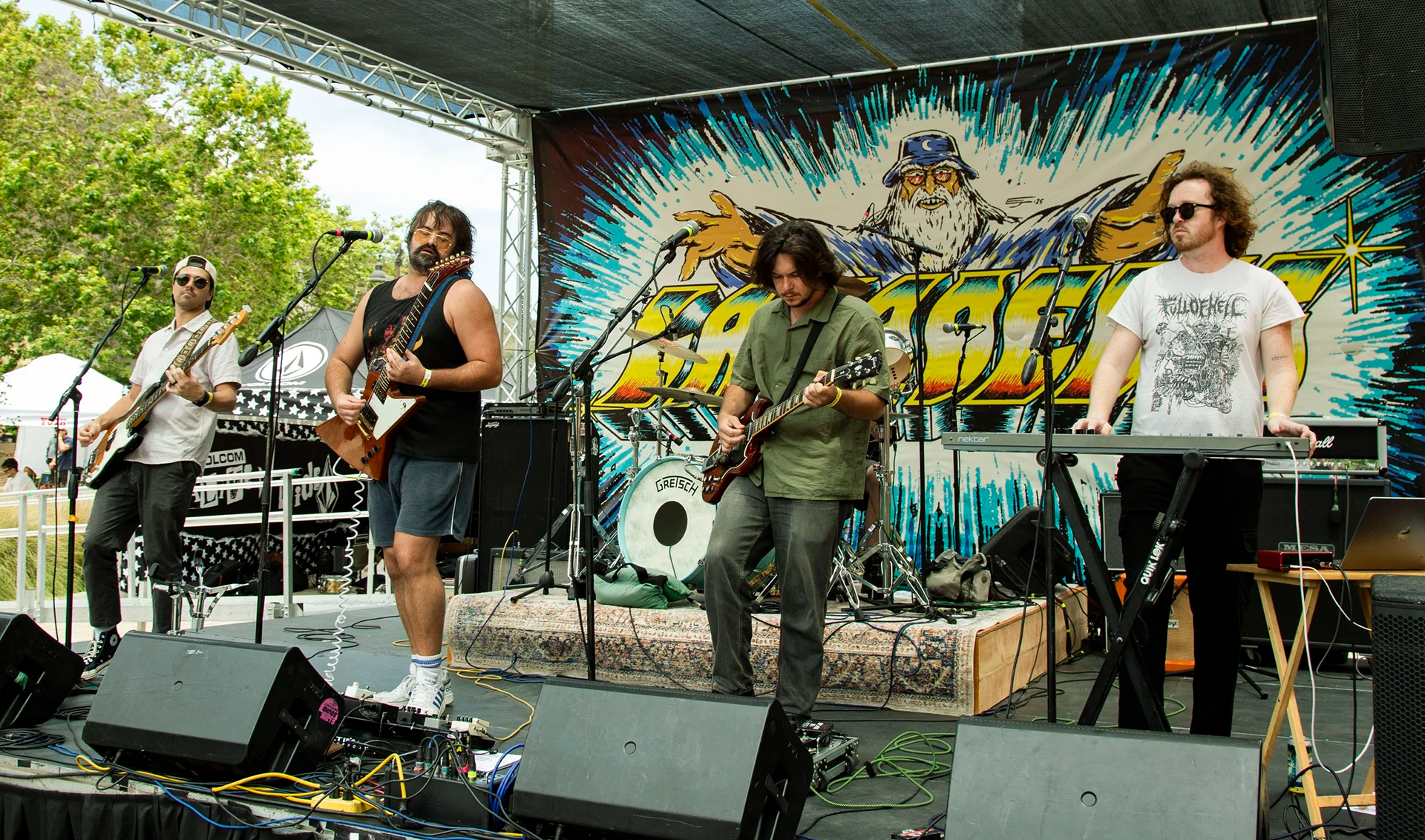 My band "Tunnels" playing in front of backdrop