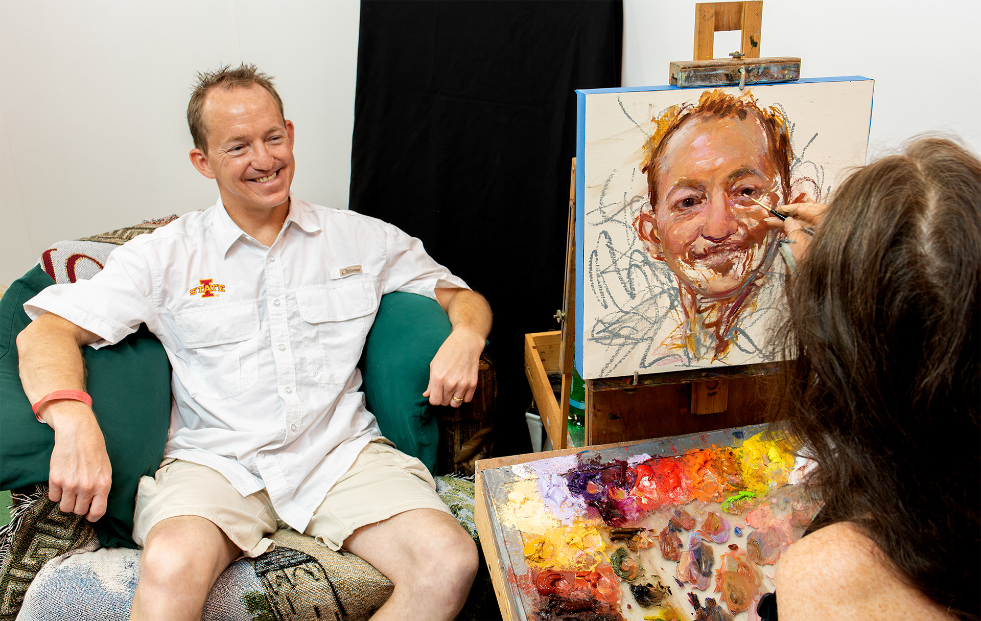 August 14, 2016 - Rose Frantzen painting Faces of Iowa State 