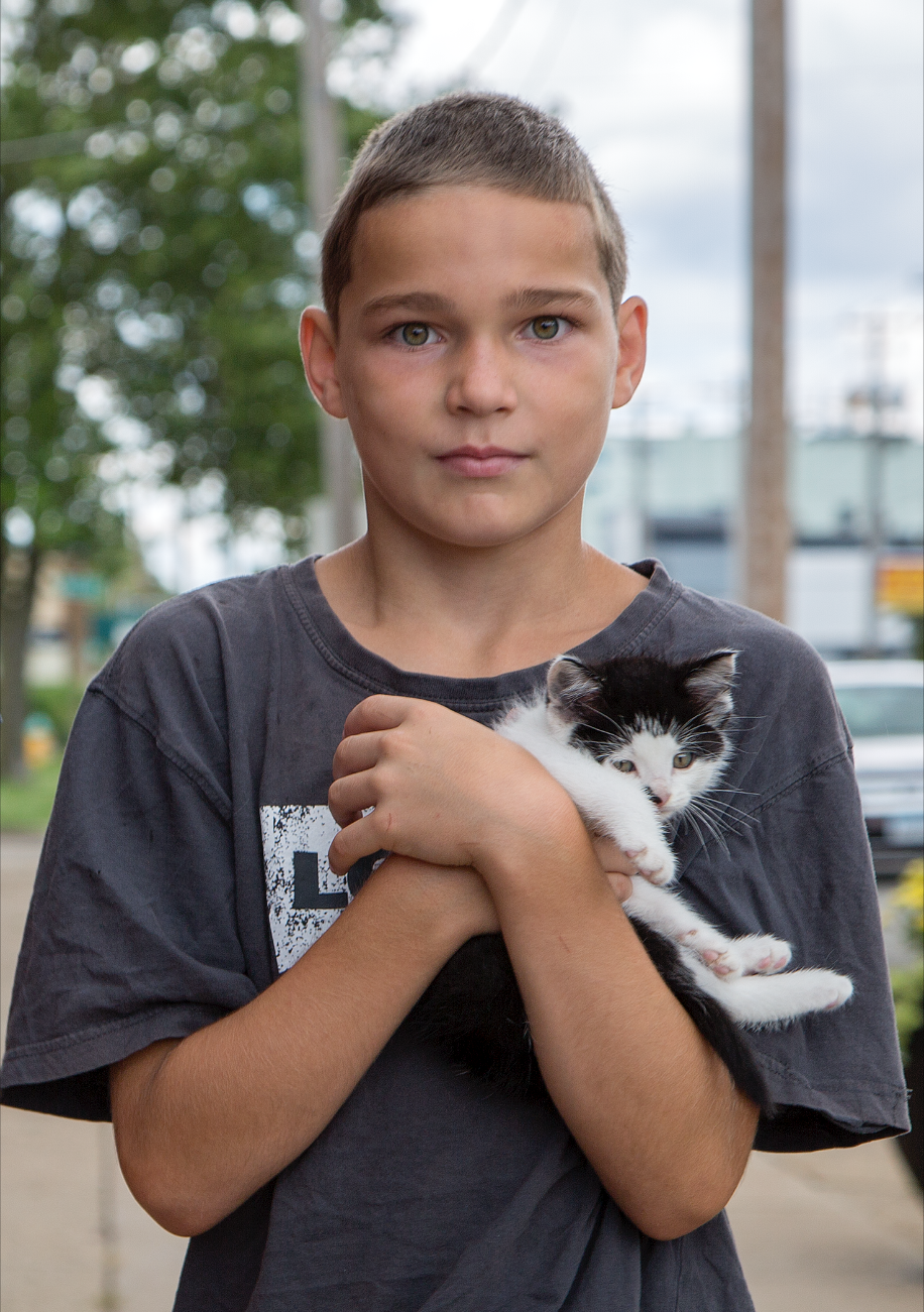 June 28, 2013 - Some kid walking with another kid on University Ave.