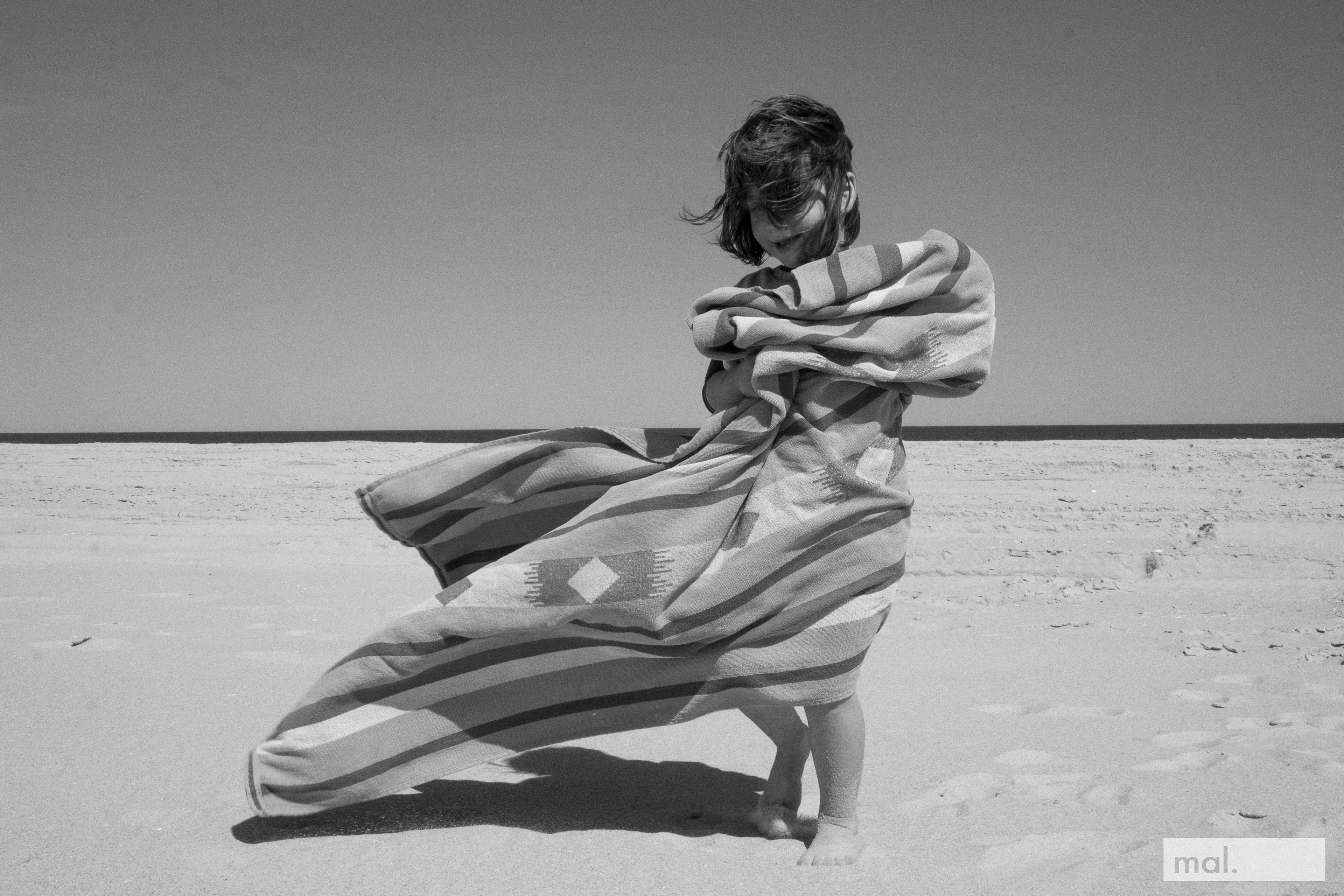 An Ultra Orthodox girl plays on the beach (Asbury Park, NJ. 2017)