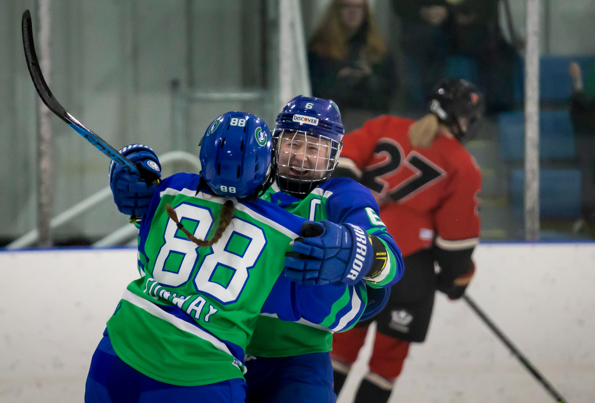 Do What You Love - While this is a professional sport, it is also a joyous exercise for these women. They play because they love the game. Shannon Turner (6) has been in the league for 8 years and still has a shining smile after she scores in a game against the Toronto Six. 