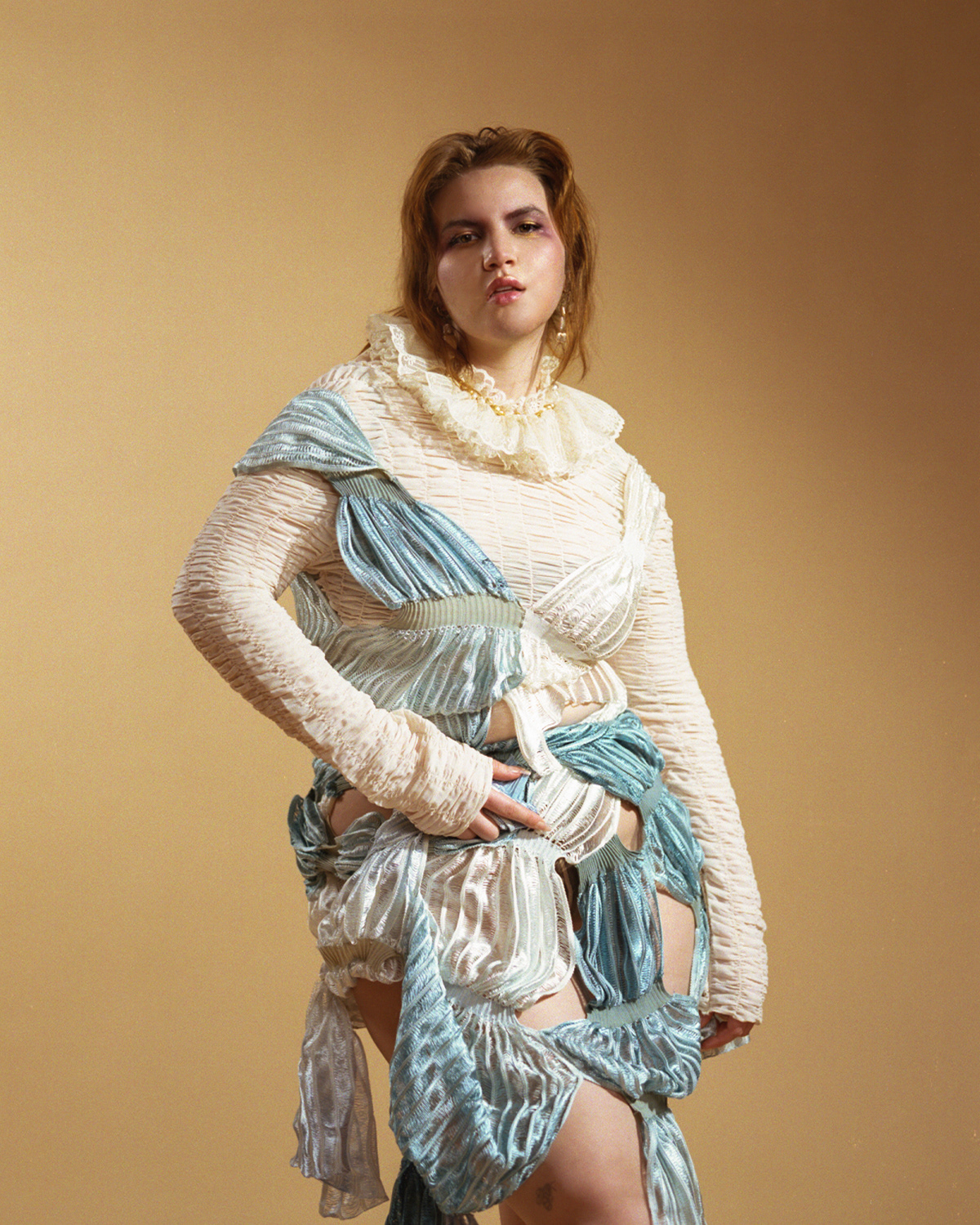 Lace & pearl ruff designed by Veronica Wolfgang from dead stock vintage materials. Dress designed by Sunny Ning.