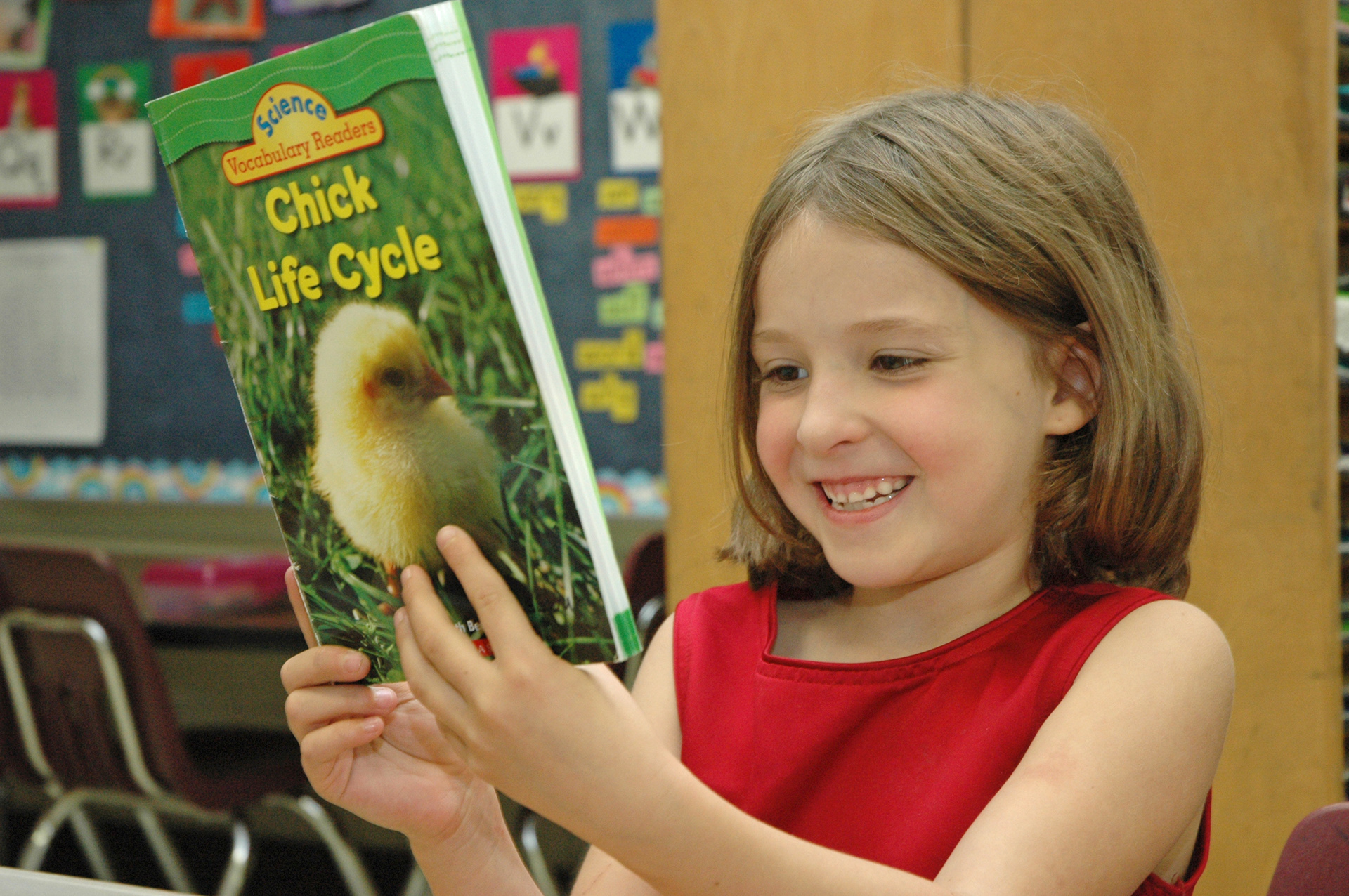 A student reads a book during class
