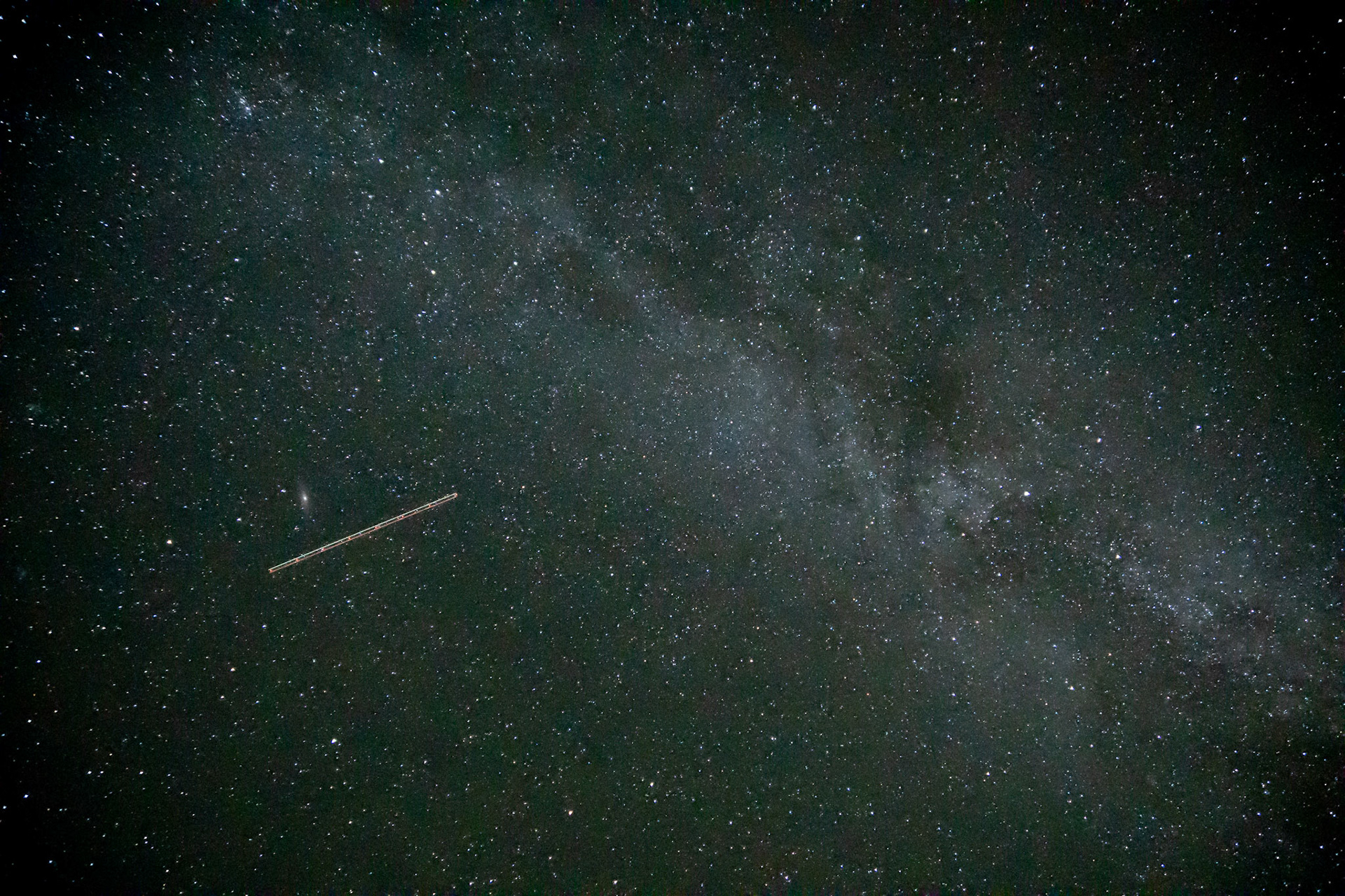 Our Milky Way Galaxy (with passing plane)