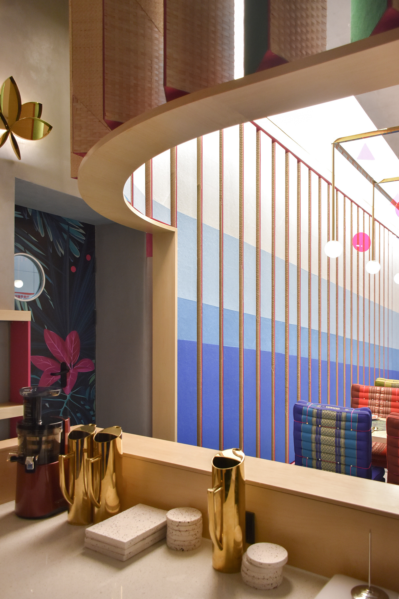 young vibe, thai restaurant, walls rotating, triangular columns,