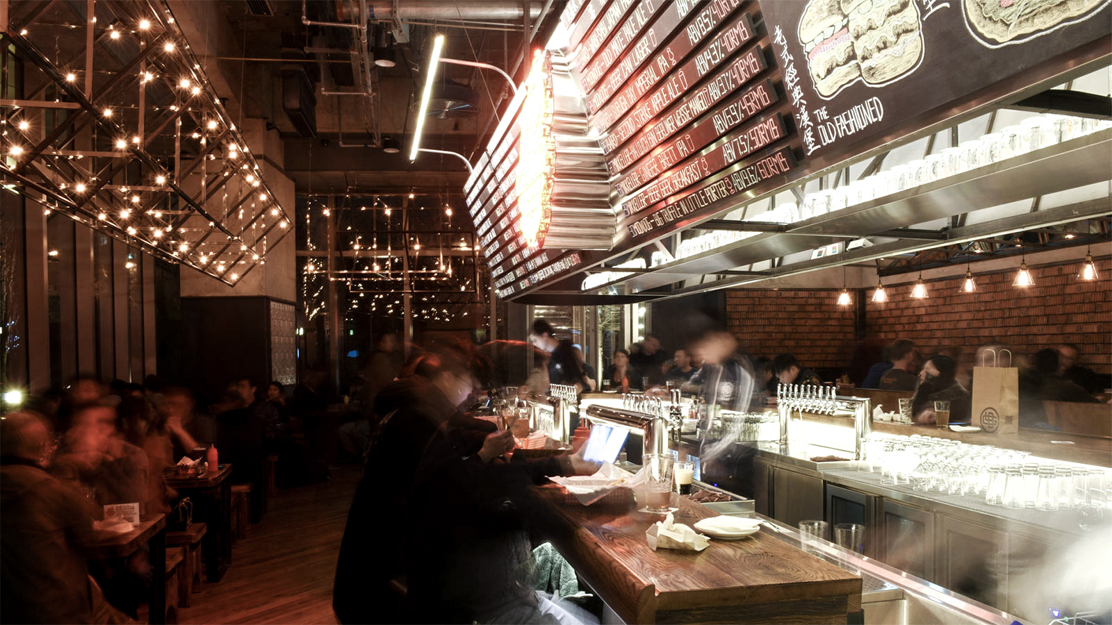 GLB, great leap brewing, ramoprimo, interior design, tap room, metal lighting, bricks on wall, bar area,