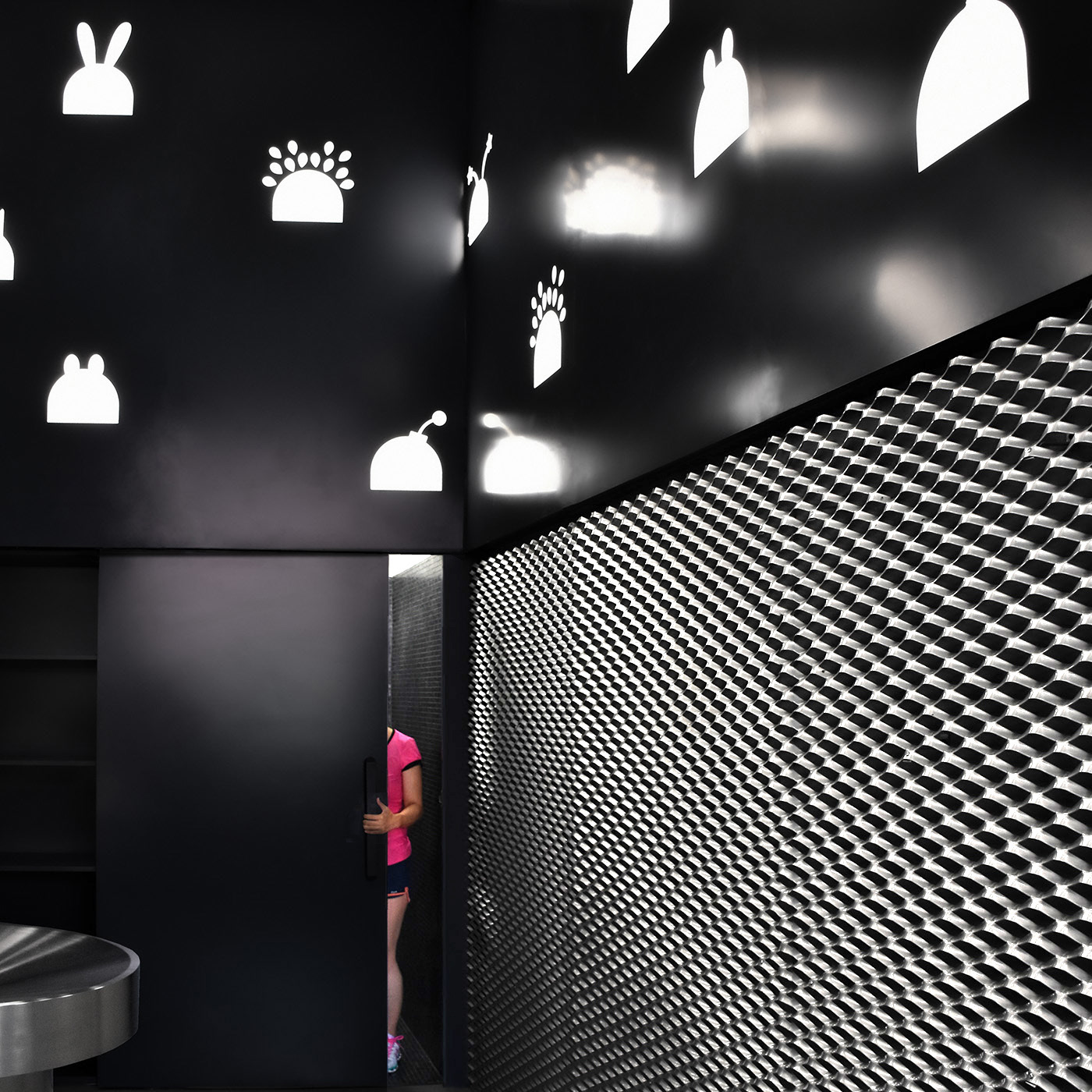 MFIT gym the black room with its dark tones and the central fountain is a space for rest and refresh design by RAMOPRIMO