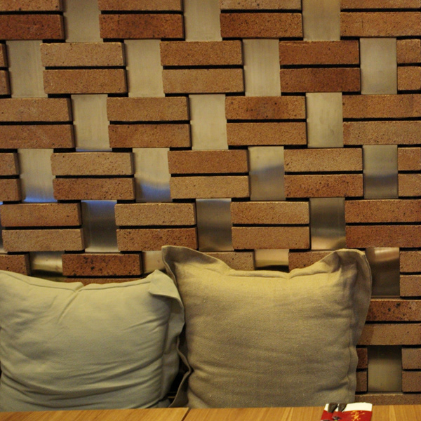 bricks, walls, soft cushions, section, ramoprimo, interior design, cornerstone, restaurant,