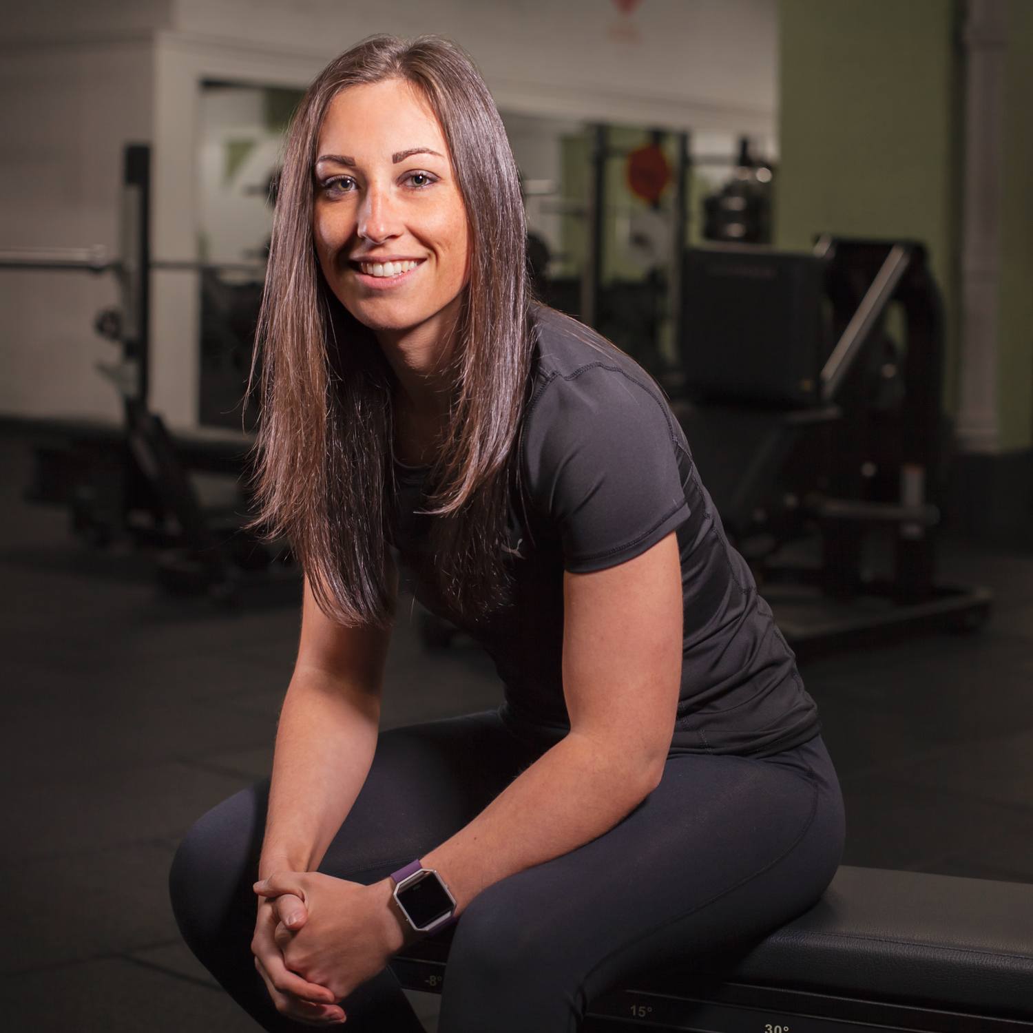 Level Up fitness Lynn smiling at camera to promote her personal trainer business. Photo by © Stefania Calderara