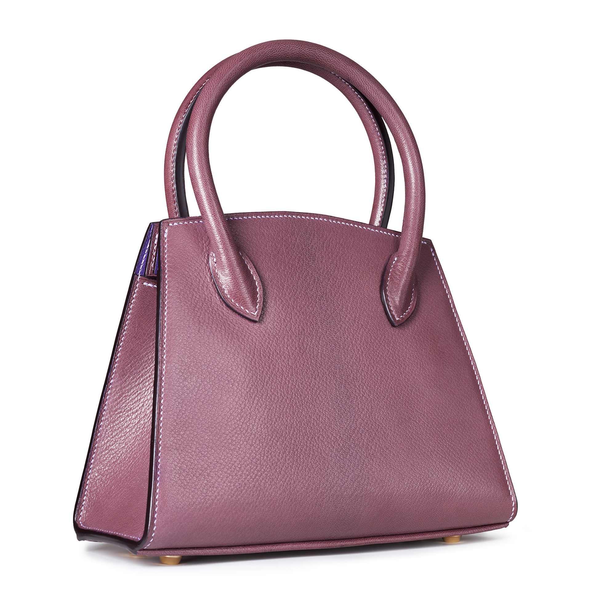 The Purple seal arca handbag, made to order leathergoods. Photo by Stefania Calderara