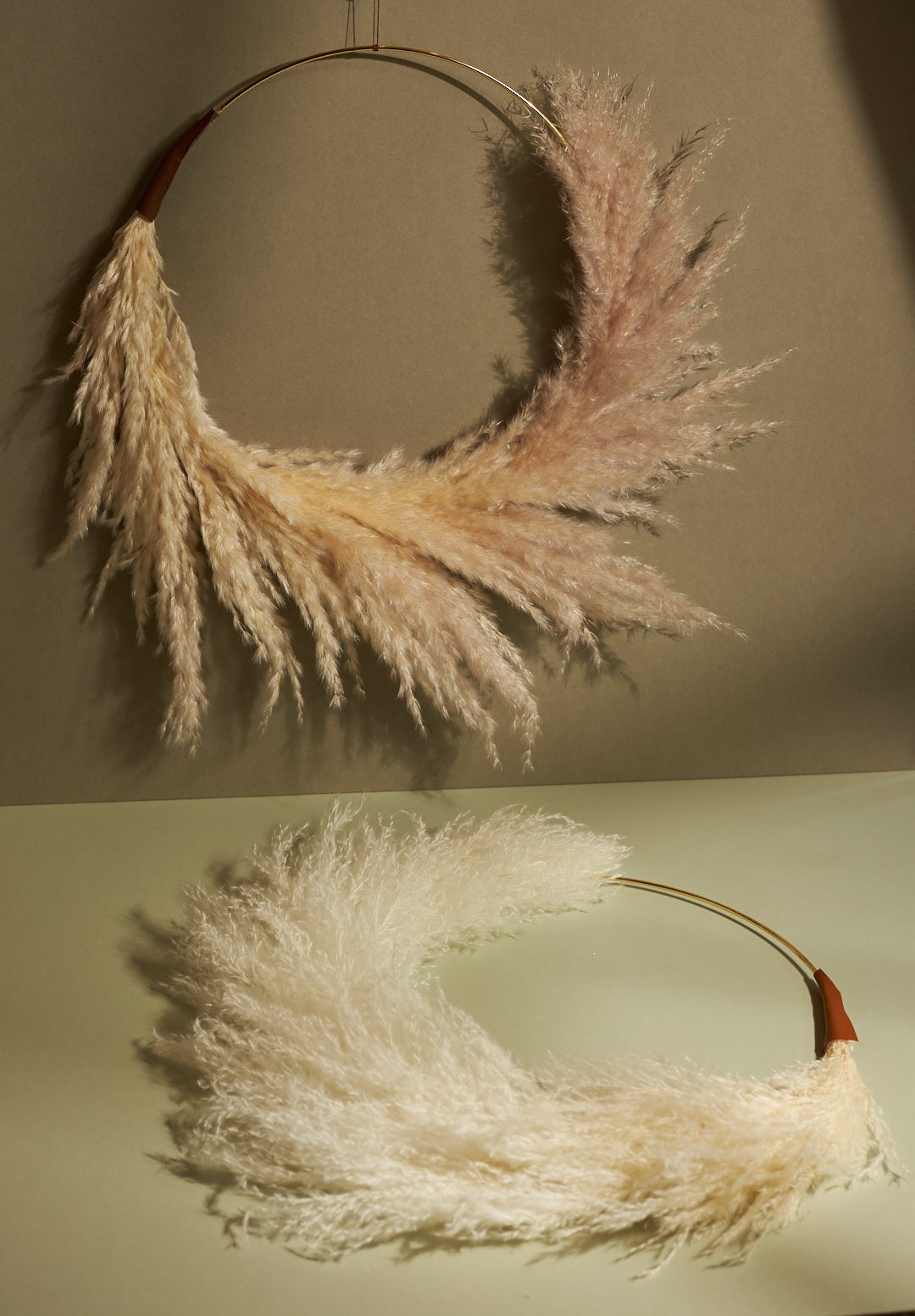 Simulating sunshine on this pair of pampas wreaths