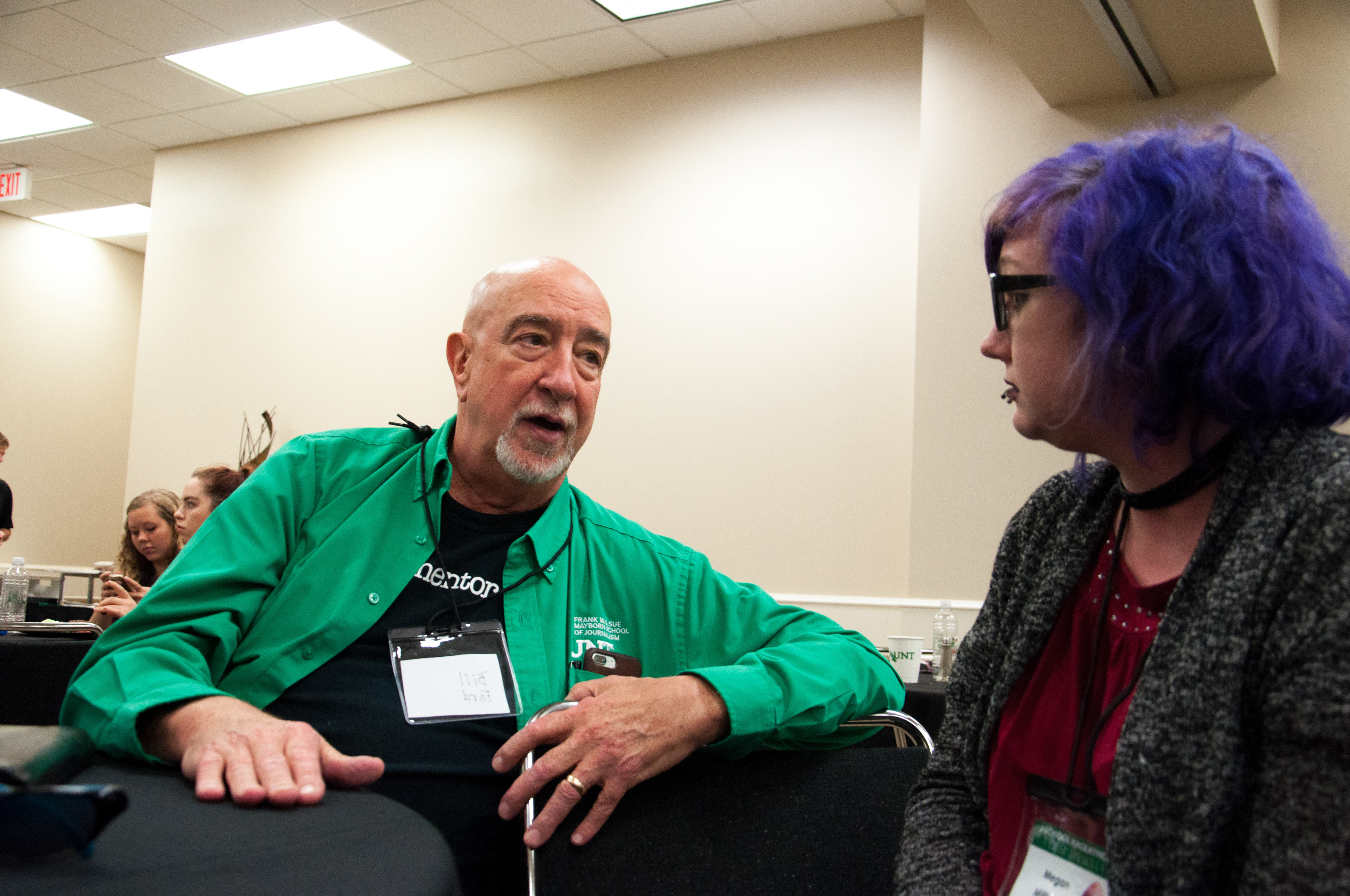 Professor and Student converse at the 2017 Hackathon at UNT