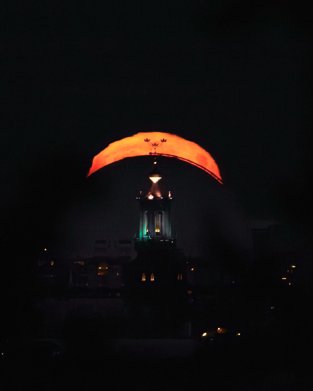Full moon rise over Stockholm Globe and City Hall
