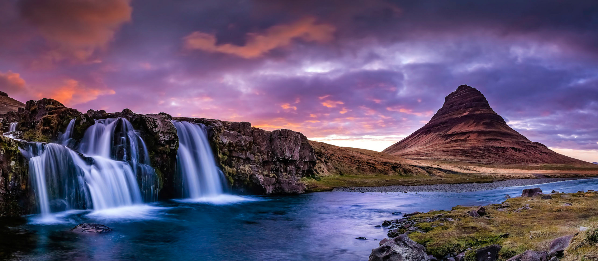 Last light as the sun is setting behind kirkjufell and kirkjufoss. This is a repost after re-processing.
