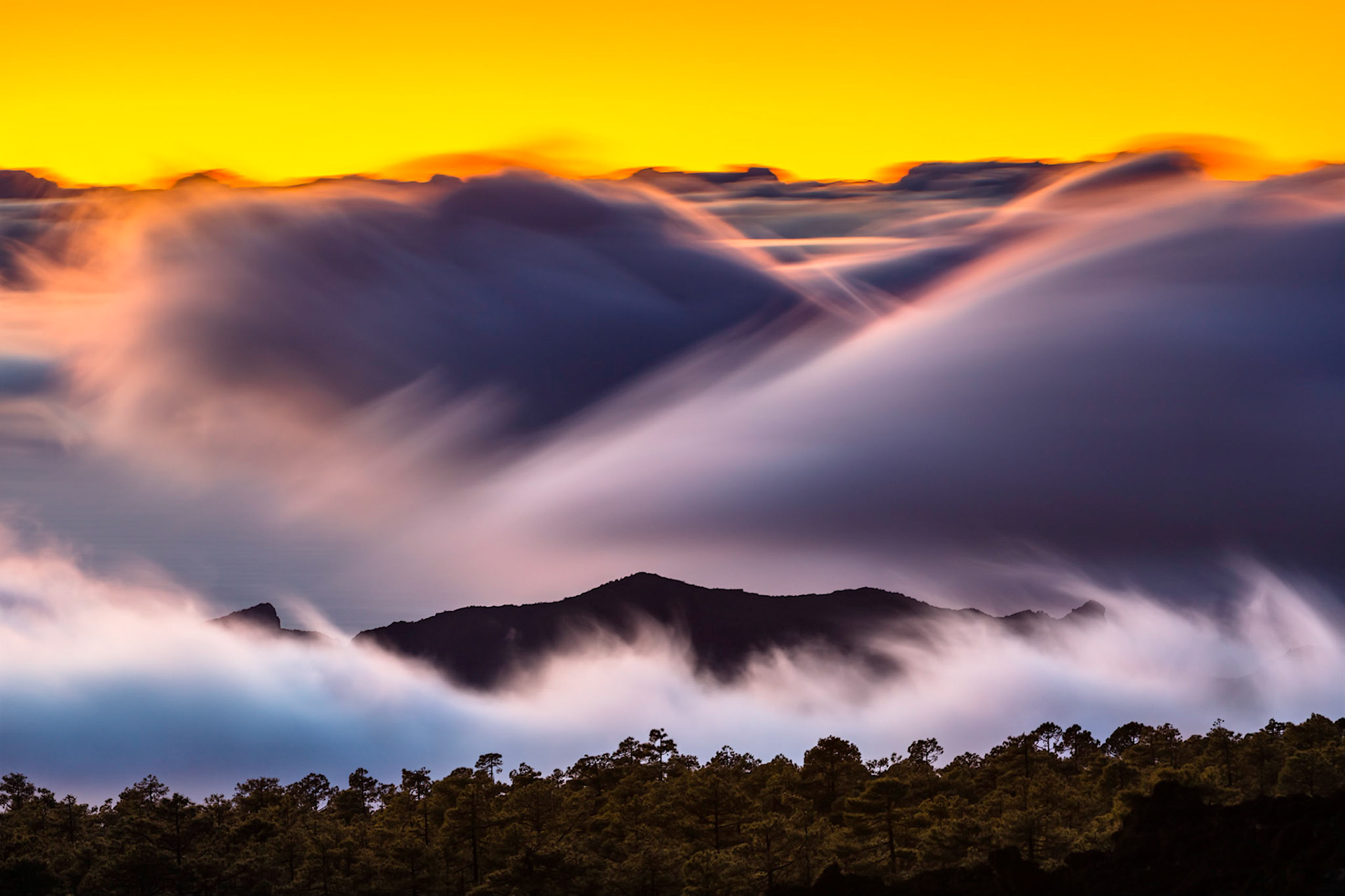 Sunset over La Gomera as seen from Corona Forestal on the Teide Volcano, Tenerife.