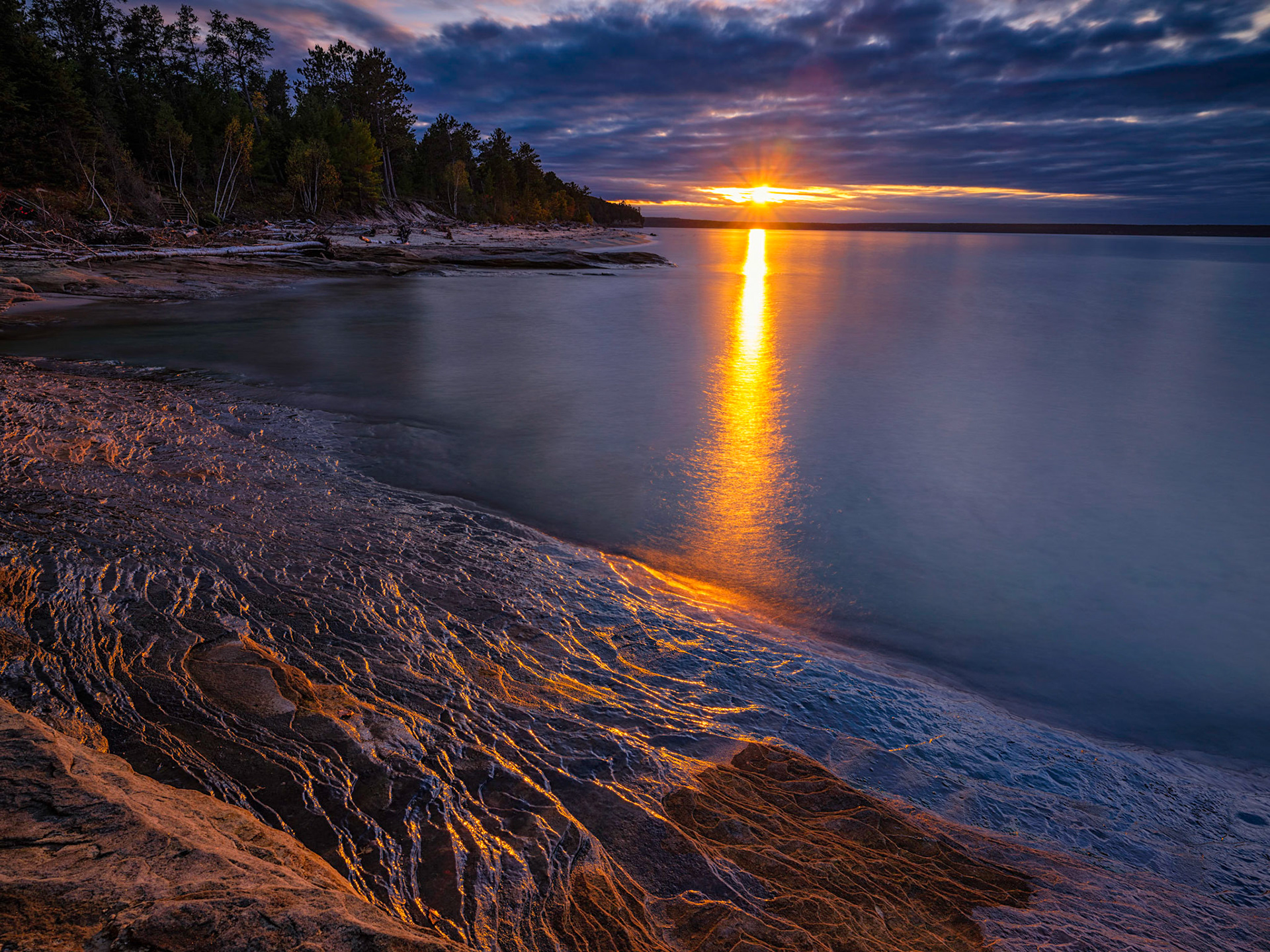 Arriving at Minors Beach to photograph Elliots Falls I was greated by this magnificient Sunset over Lake Superior.