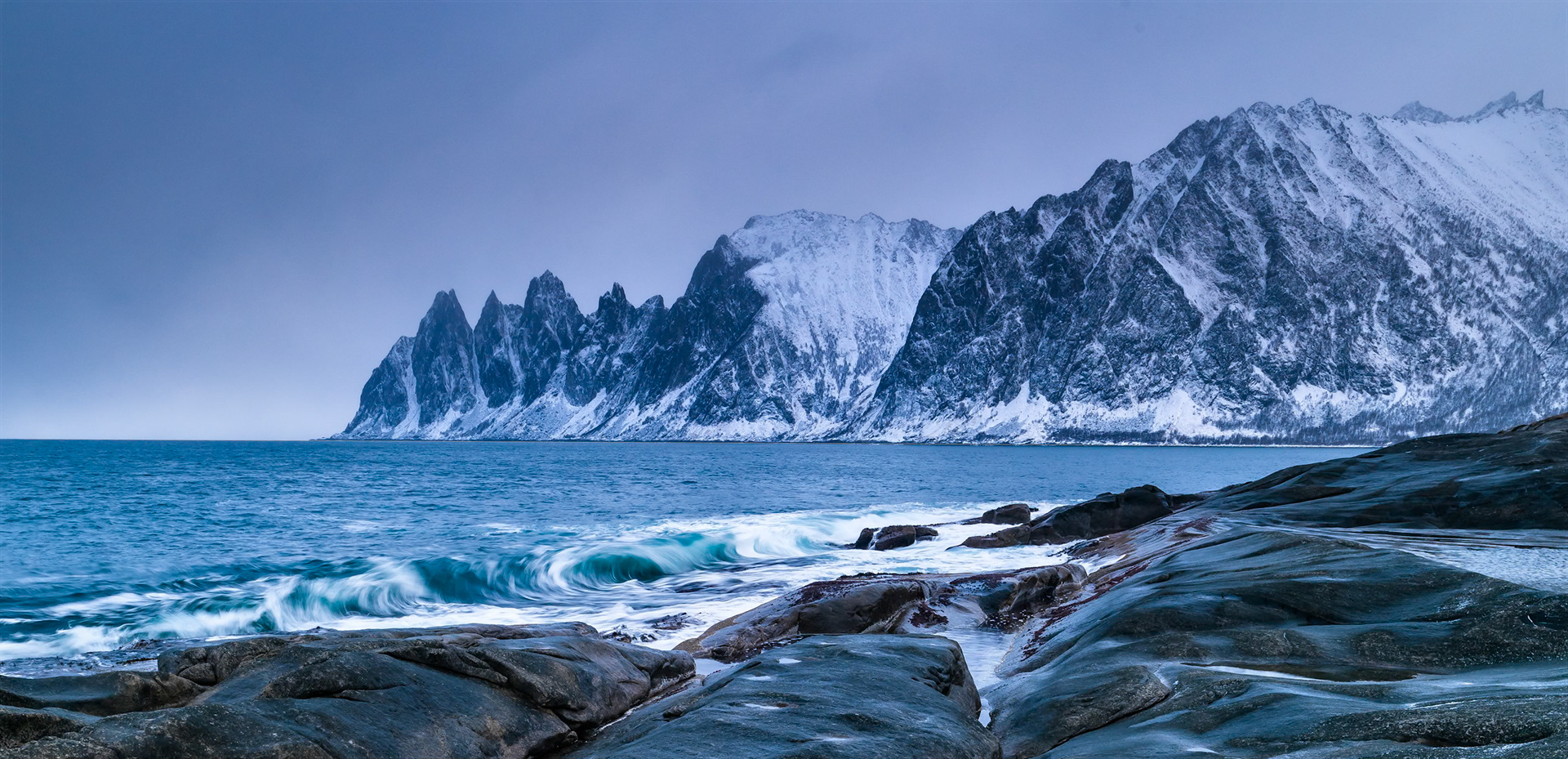 Capturing the waves coming in between snow showers.