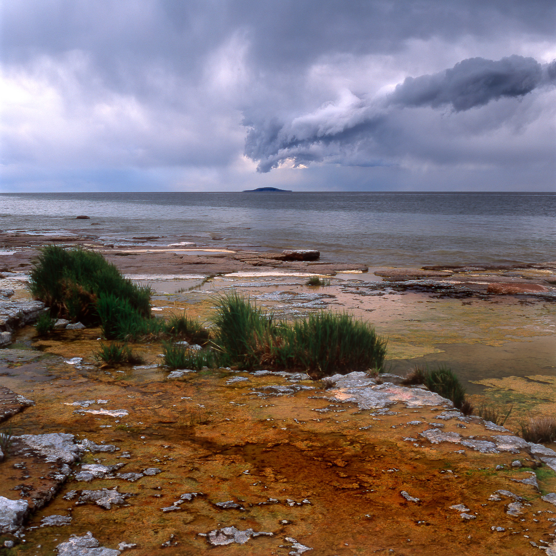 View of the Blå Jungfruen National Park on a summer day as seen from Öland.
