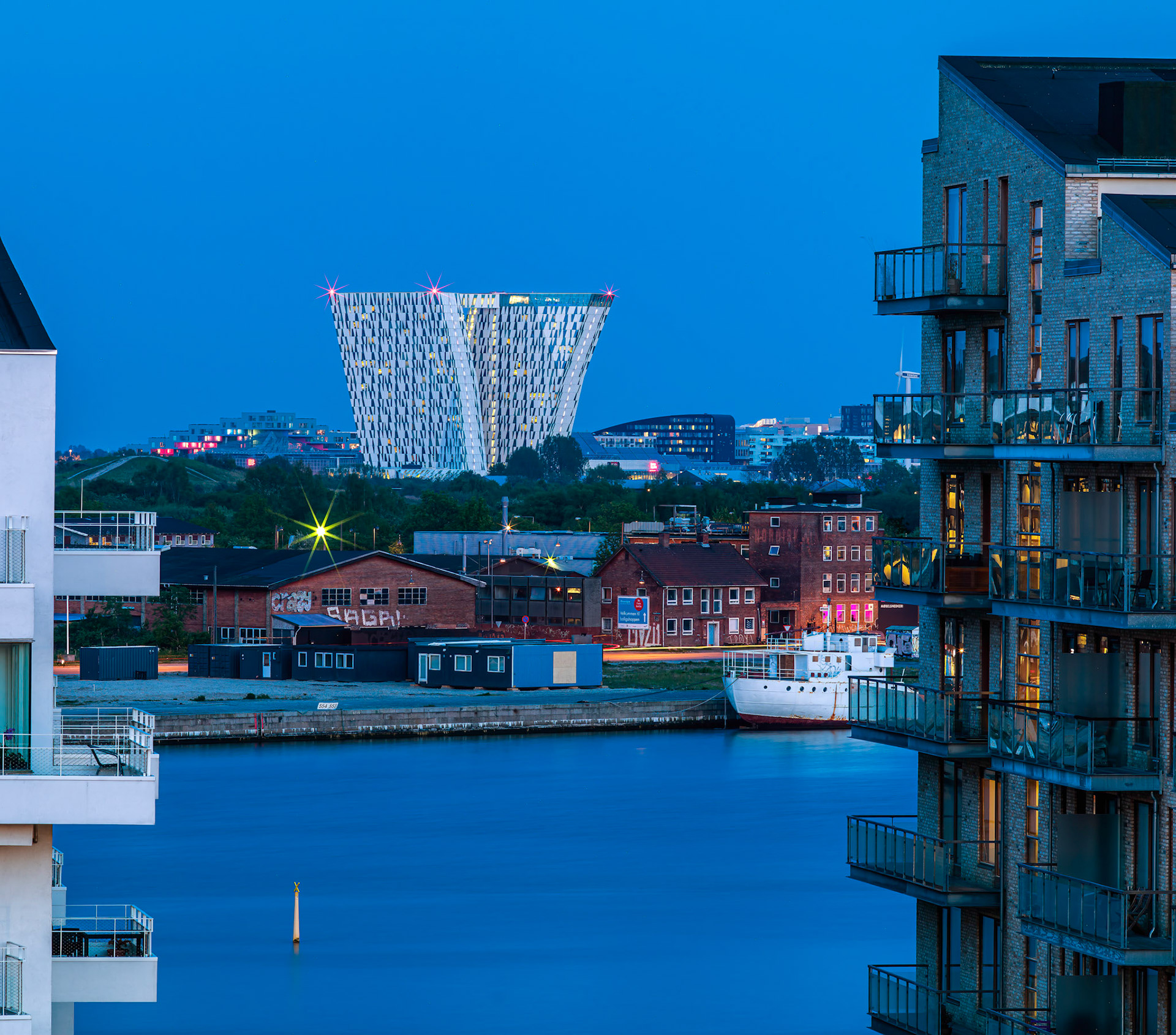 Bella Sky during the Blue Hour with Ørestaden surrounding it