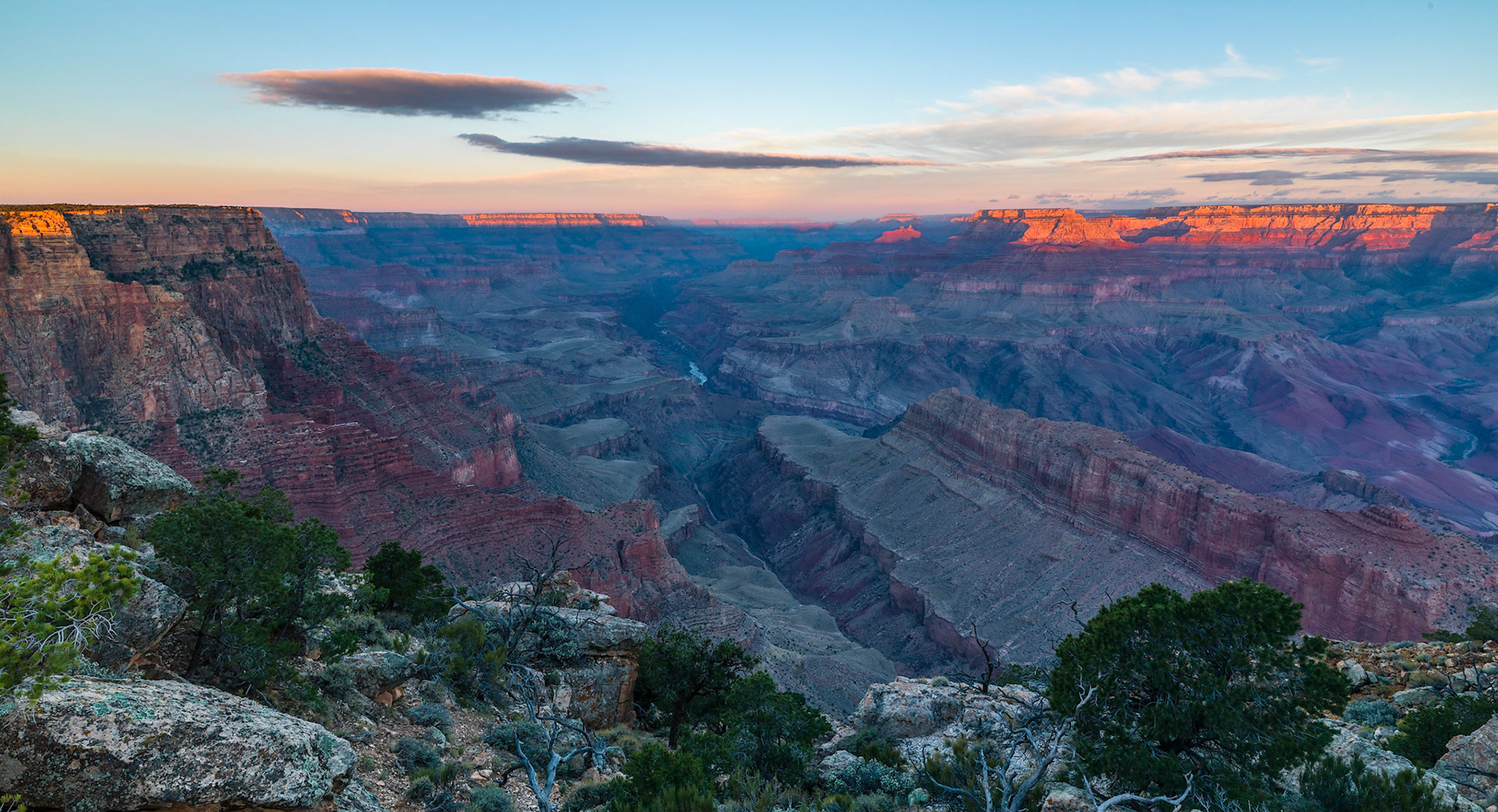 Getting up early in the morning to watch the sun rise over Grand Canyou is spectacular display of natures grandness.