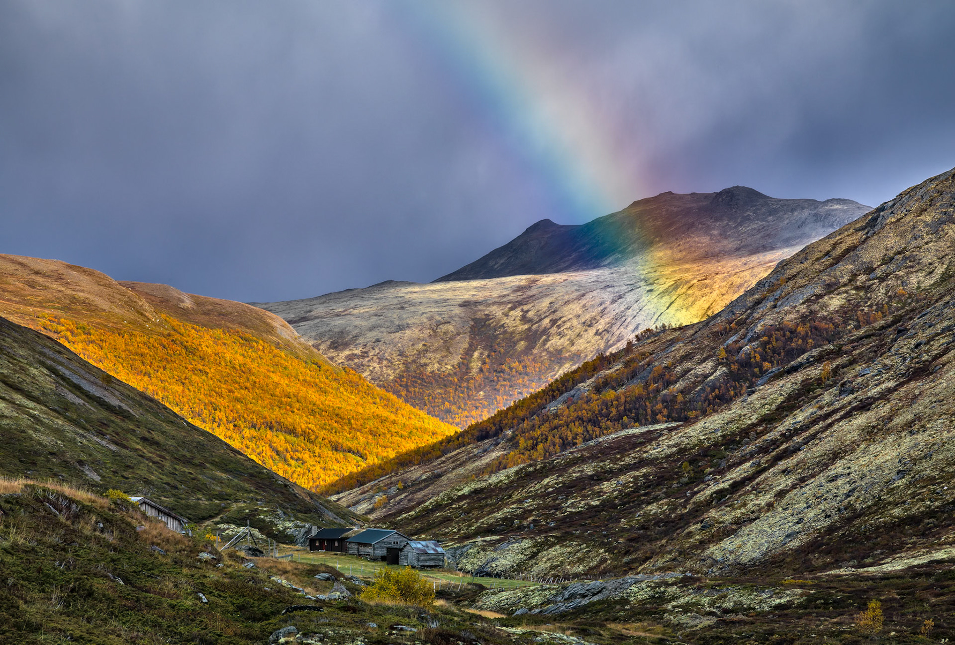 Rainbow apears during rainy spell in Grimsdalen, Norway