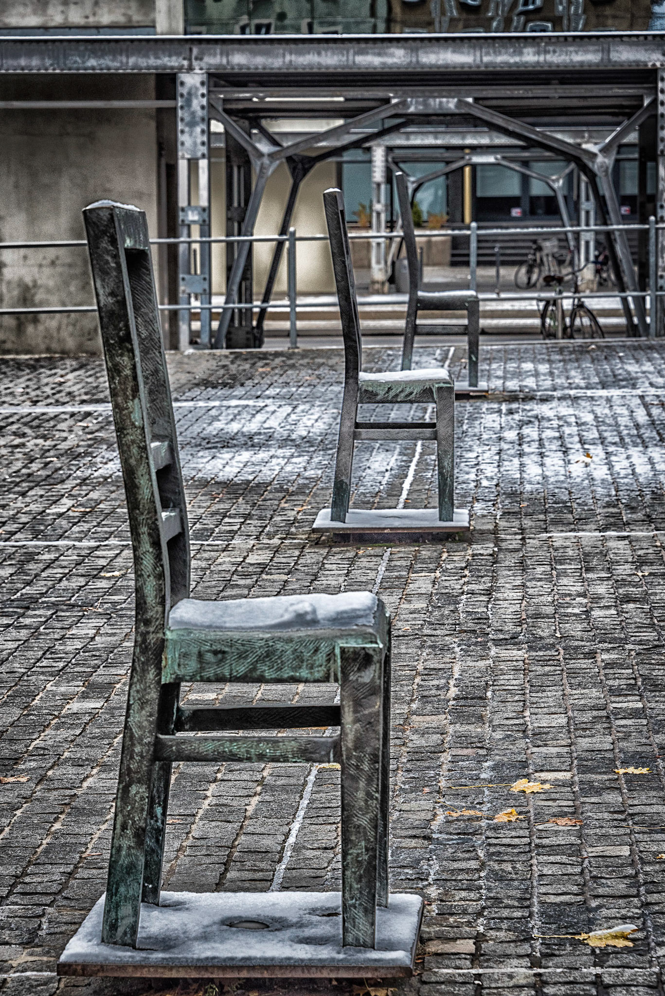 Ghetto Heroes Square with its 33 memorial chairs made of cast iron and bronze. The chairs symbolize the tragedy of the Polish Jews, inhabitants of Krakow, who were imprisoned in the Krakow Ghetto during WWII and later murdered by the Germans in the ghetto and in several German death camps.