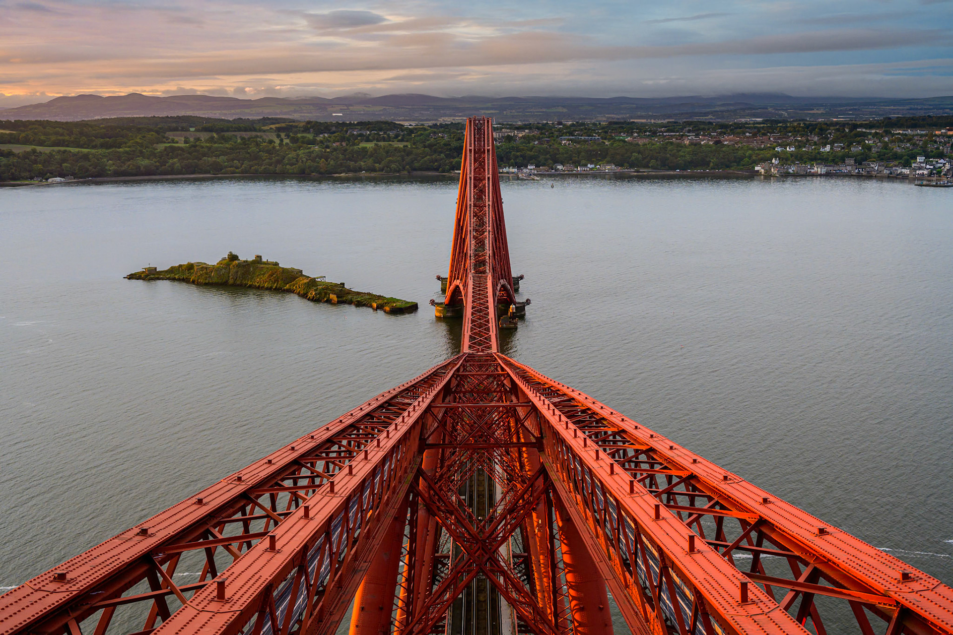 Forth Rail Bridge, North Queensferry Fife, Scotland, UK. 22nd Sept, 2023. Sunrise view looking south from the platform atop the Fife Cantilever tower of the Forth Rail Bridge.