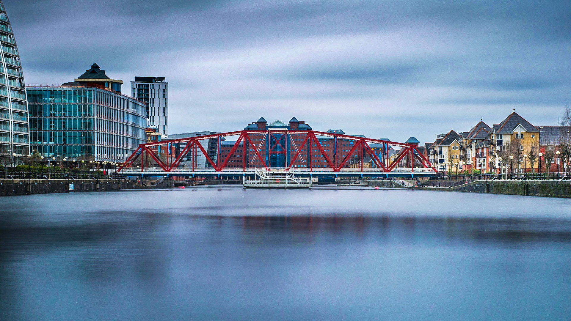 The Detroit Bridge is a Salford Quays landmark.  The 80-metre long footbridge spans Dock 9 linking Harbour City and Metrolink to The Lowry and The Designer Outlet.