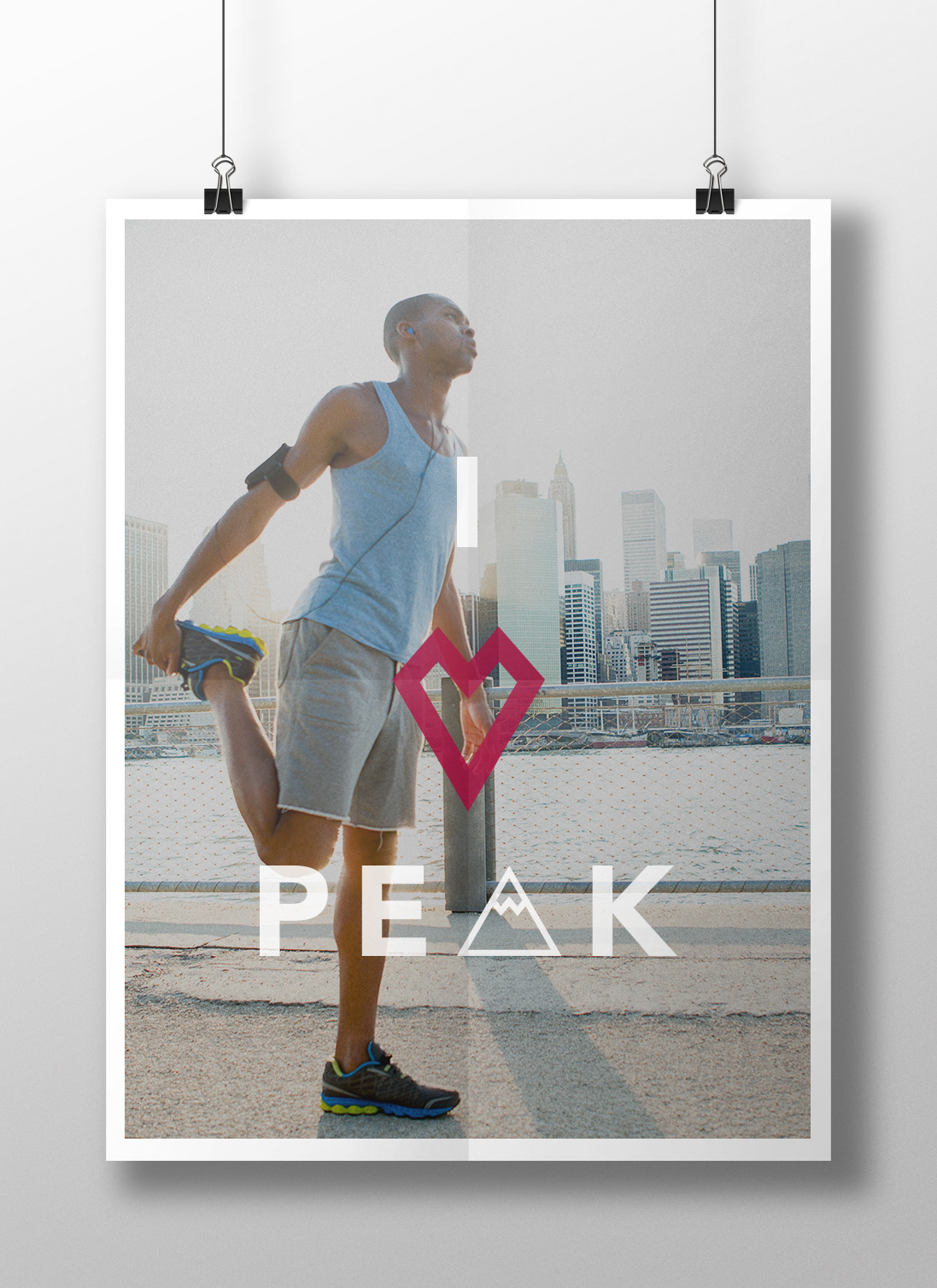 I heart peak poster featuring a runner stretching his leg in the background
