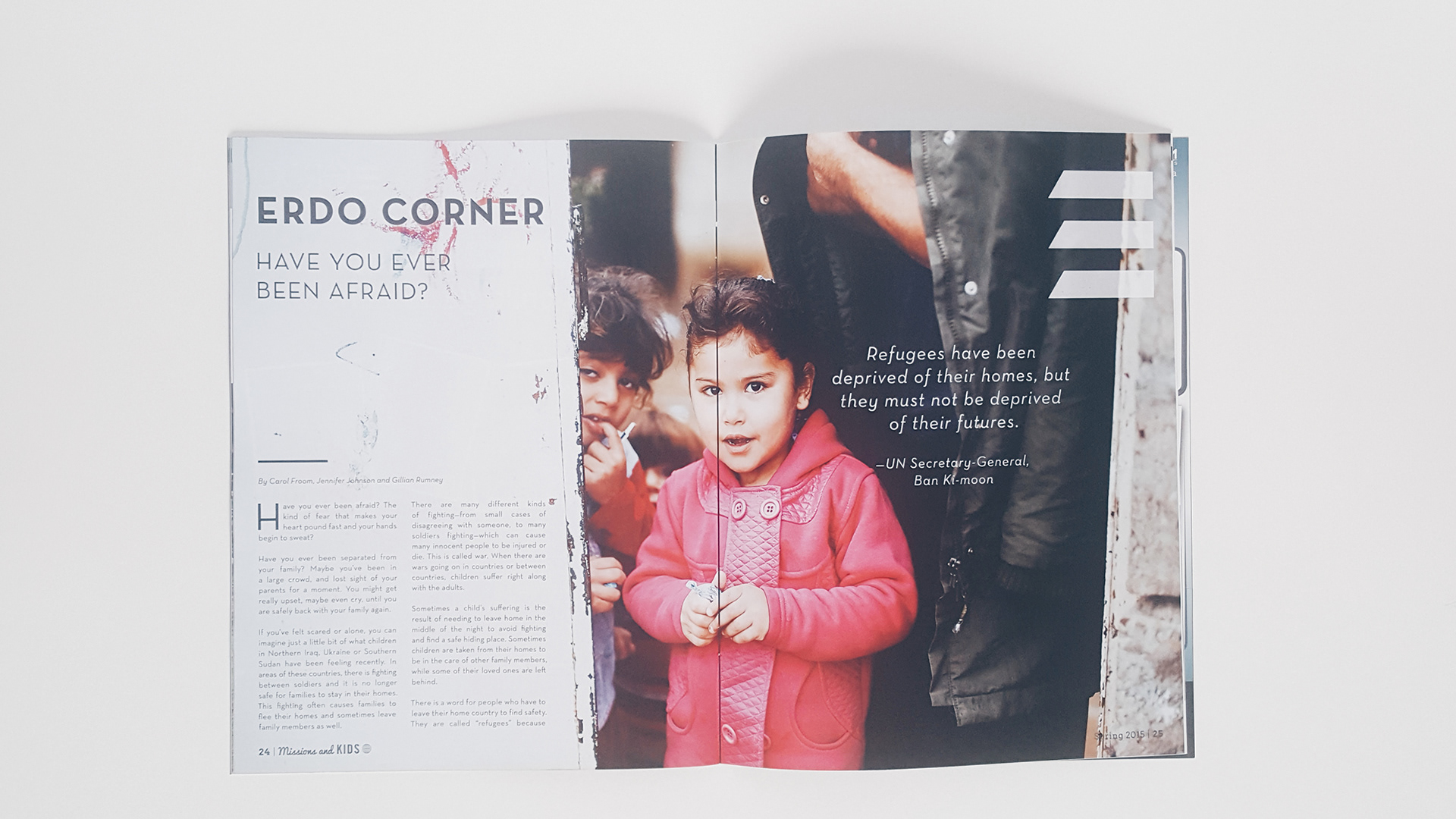 ERDO corner opening spread with photo of a child receiving aid
