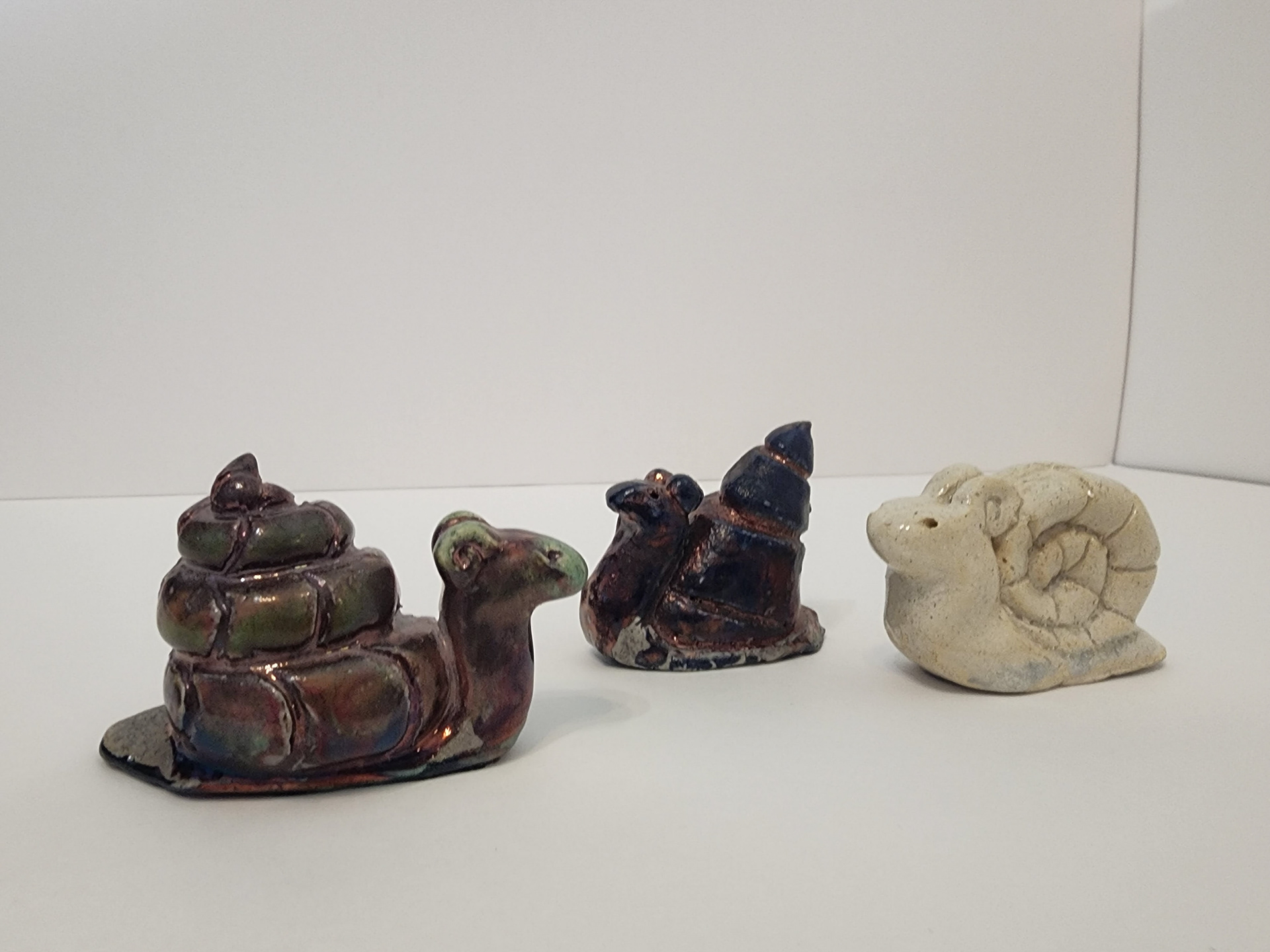 Stoneware Raku Fired. (Left to right) Copper Turquoise, Blue Copper, Clear