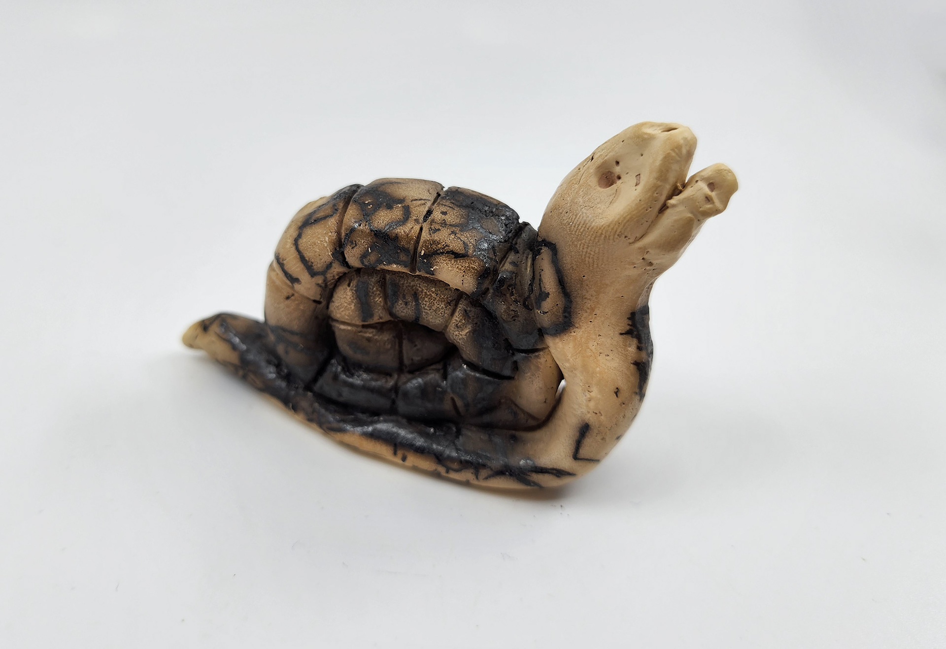 Stoneware with burned hair surfacing