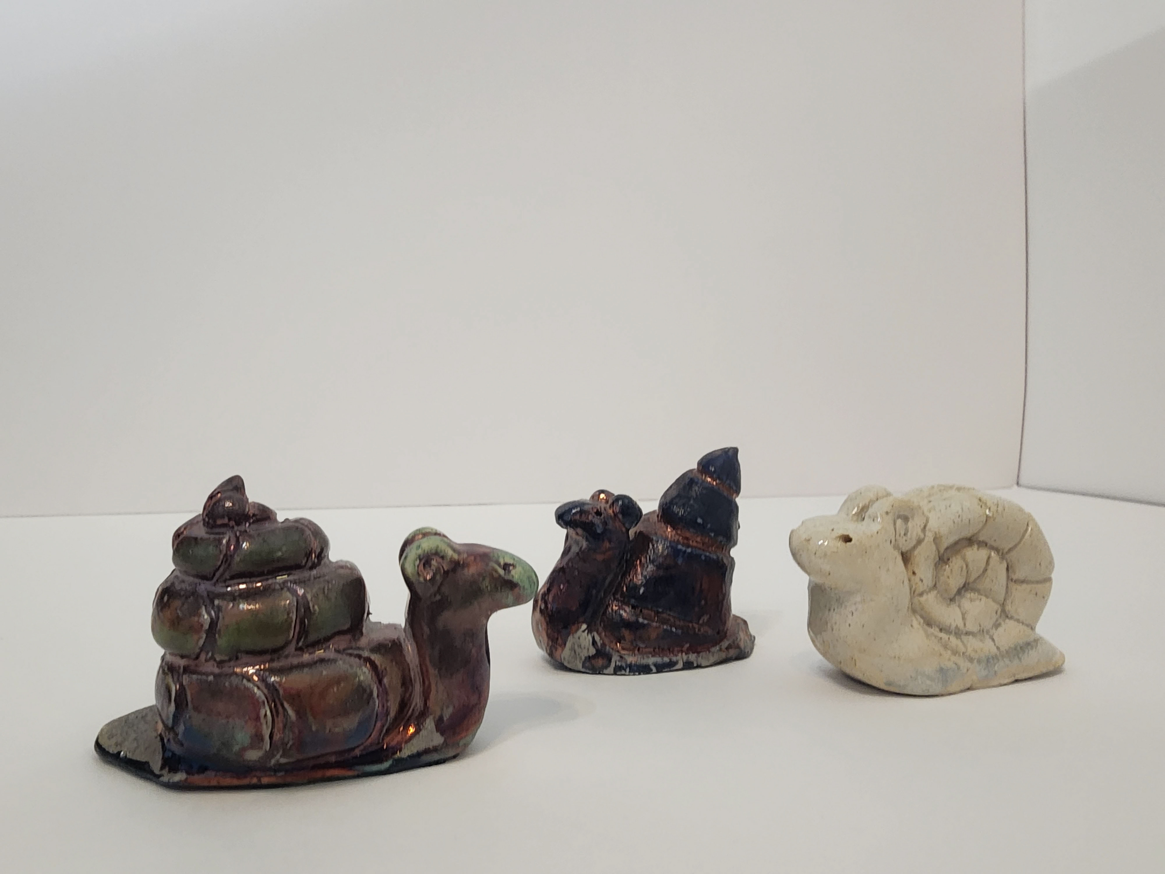 Stoneware Raku Fired. (Left to right) Copper Turquoise, Blue Copper, Clear