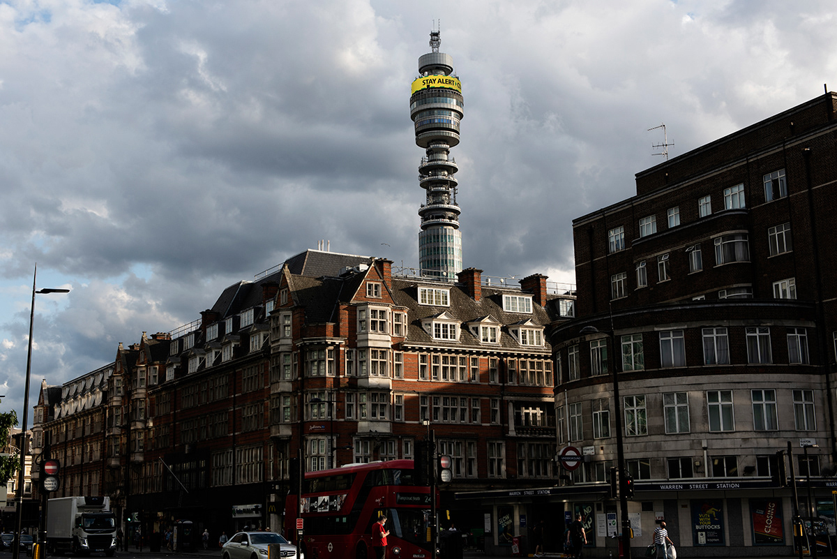 BT tower, Euston road, Central London.   On the 10th of May, the Prime Minister changed the slogan from “Stay Home” to “Stay Alert”, to ease some lockdown restrictions.  The announcement spread confusion among people and attracted criticism both by leaders and members of the scientific community. In Wales and Scotland, the devolved governments who control health decide to keep the original slogan - Stay at home, Protect the NHS, Save lives.