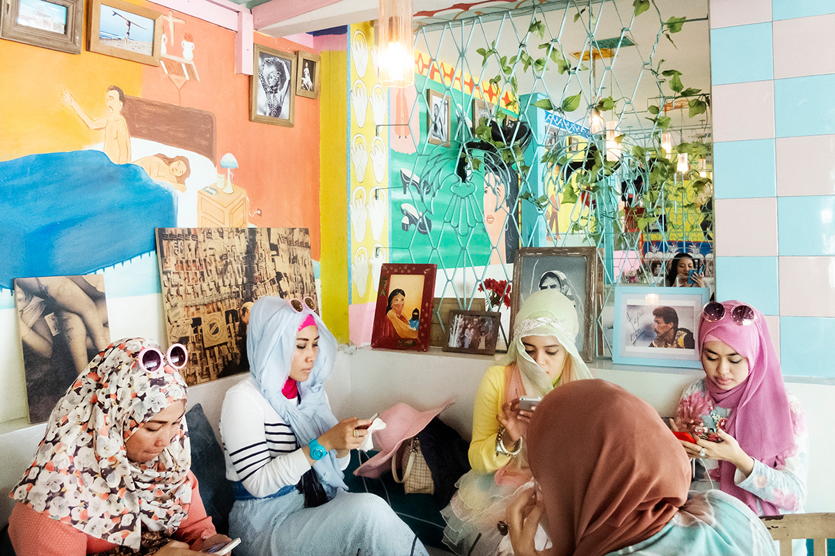 Group of girlfriends in a restaurant in Bali.