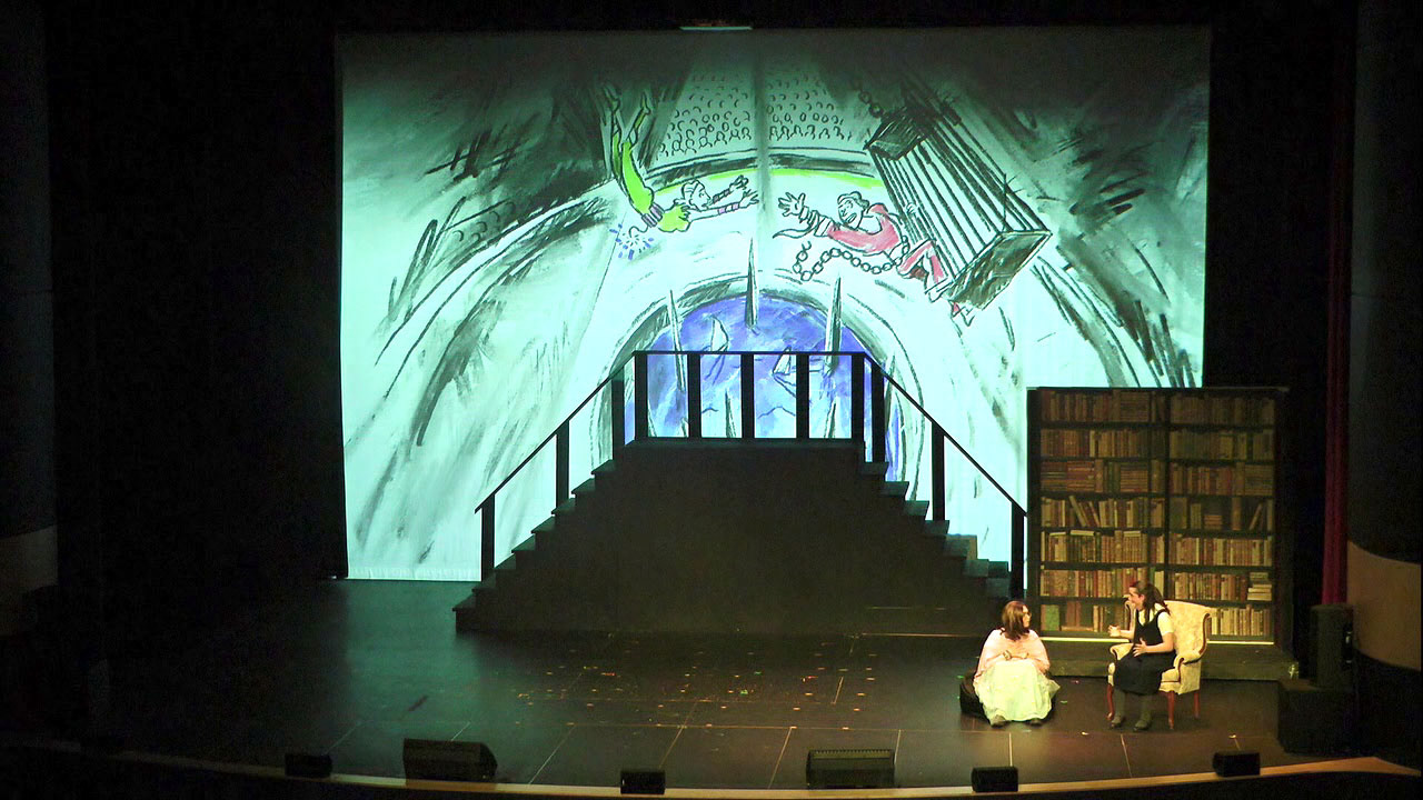Charcoal sketch of a husband and wife performing a death-defying acrobatic act over sharp objects, with dynamite attached to the acrobat, projected onto a screen during the live performance of Matilda The Musical.