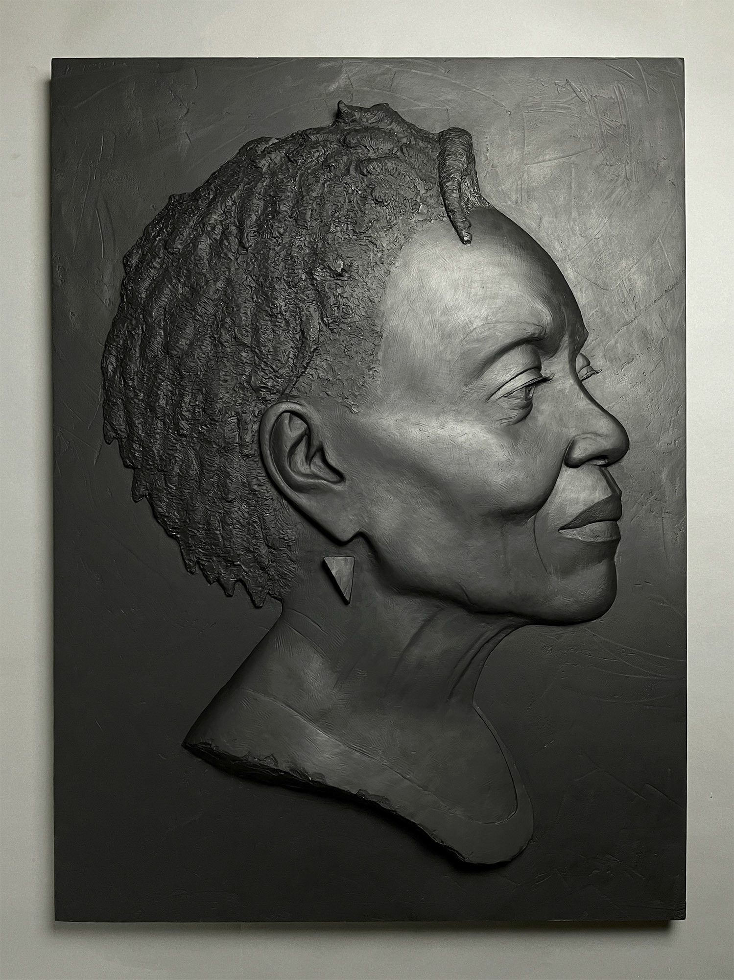 "Basically Lawless", 2022, Fiberglass reinforced plaster, graphite, resin, wood, 38h" x 28"w x 3"d