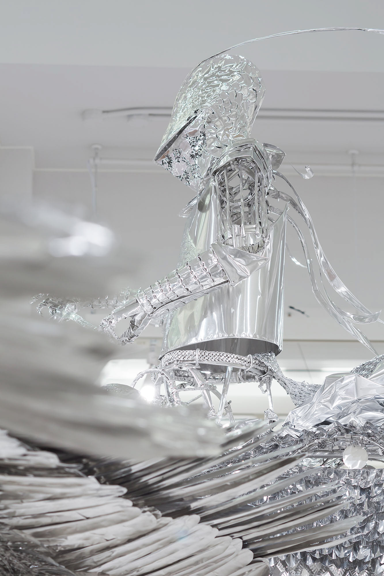 Title: Anonymous relatives-Archaeologist-, Material: Aluminium foil Size:600x550x300cm Year:2014