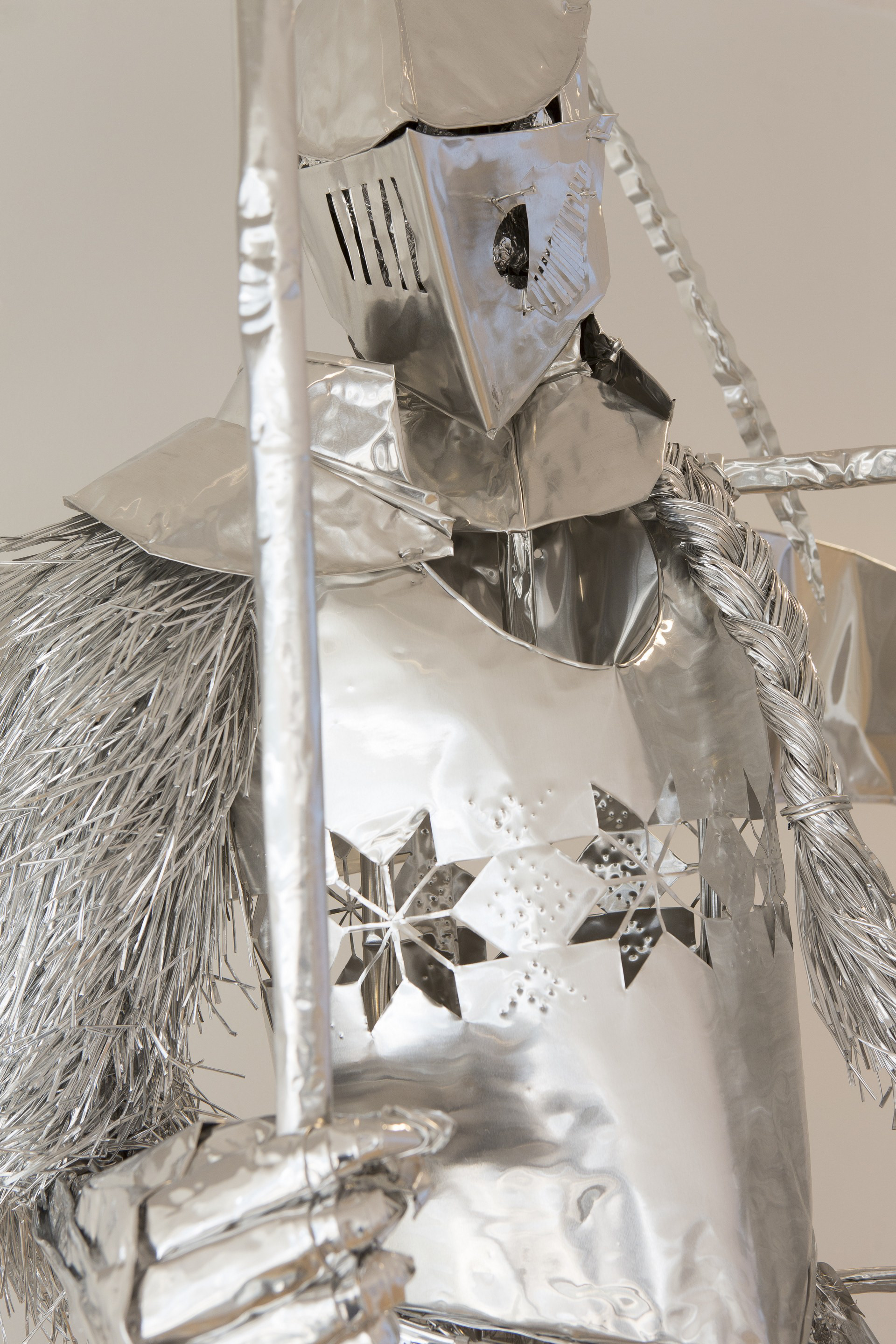 Title: Anonymous relatives -gate keeper-, Year:2013, Material:Aluminum foil, Size:130x90x 250(h)cm Photo by Mike Bink