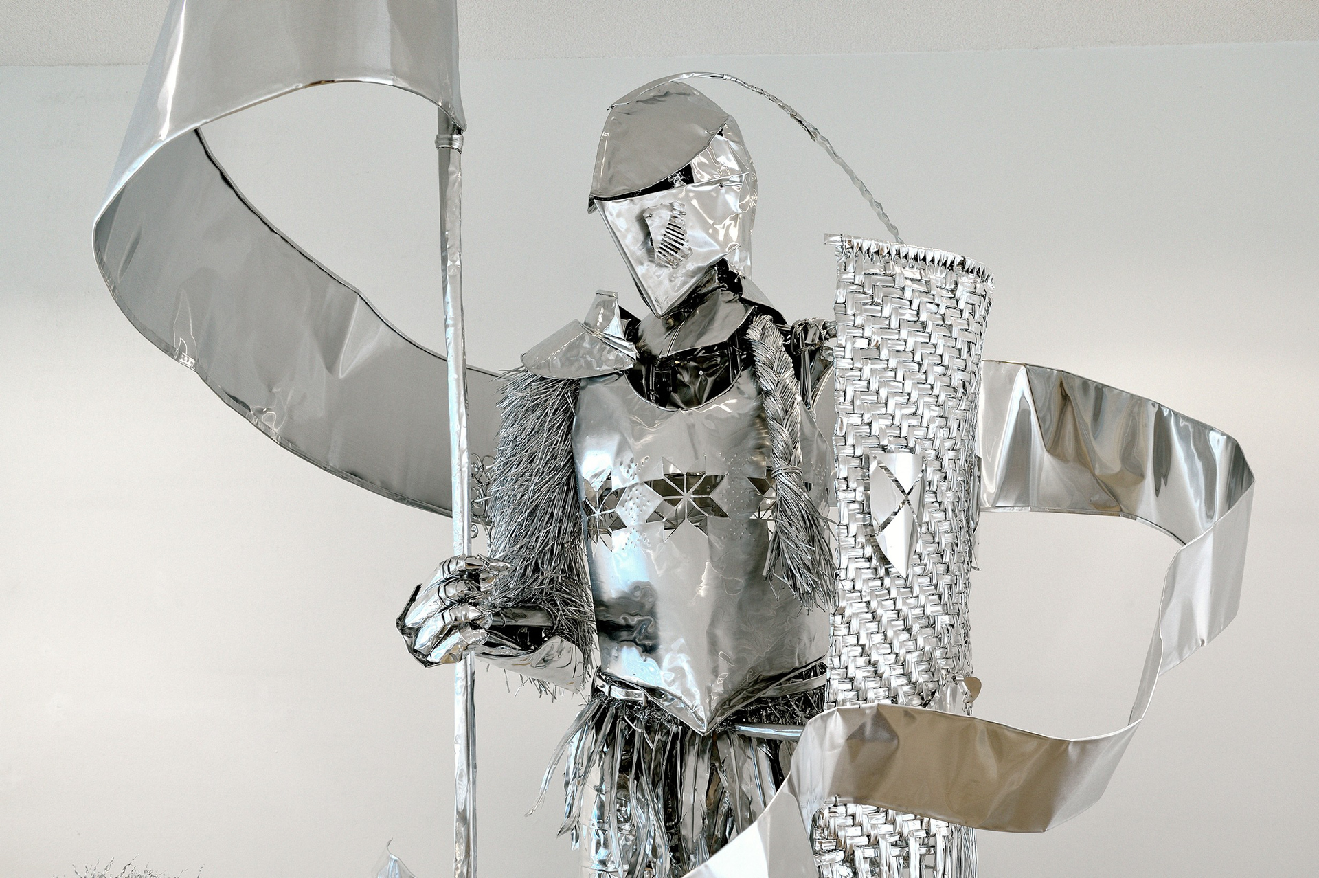 Title: Anonymous relatives -gate keeper-, Year:2013, Material:Aluminum foil, Size:130x90x 250(h)cm Photo by Mike Bink